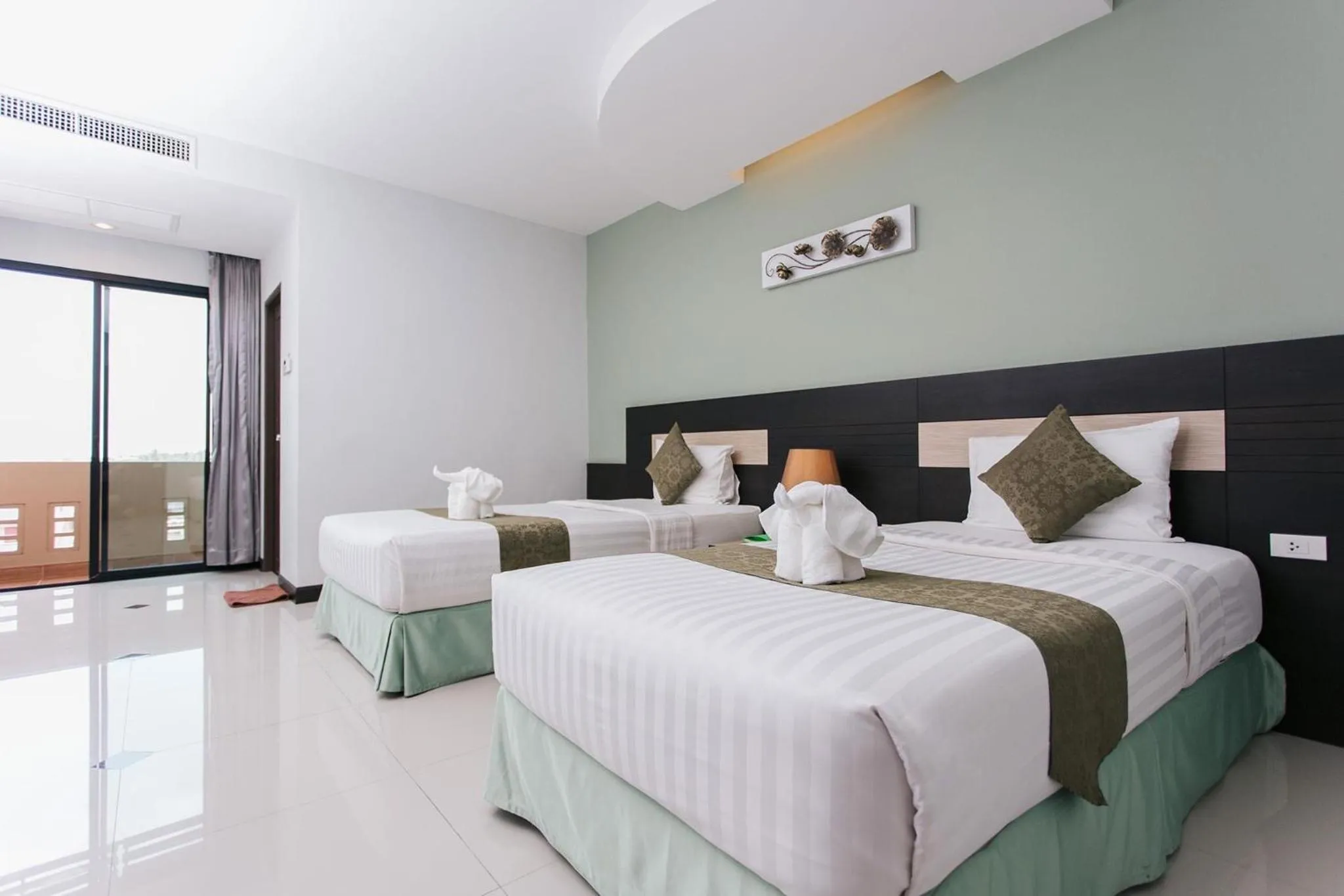 Bed in The Centris Hotel Phatthalung