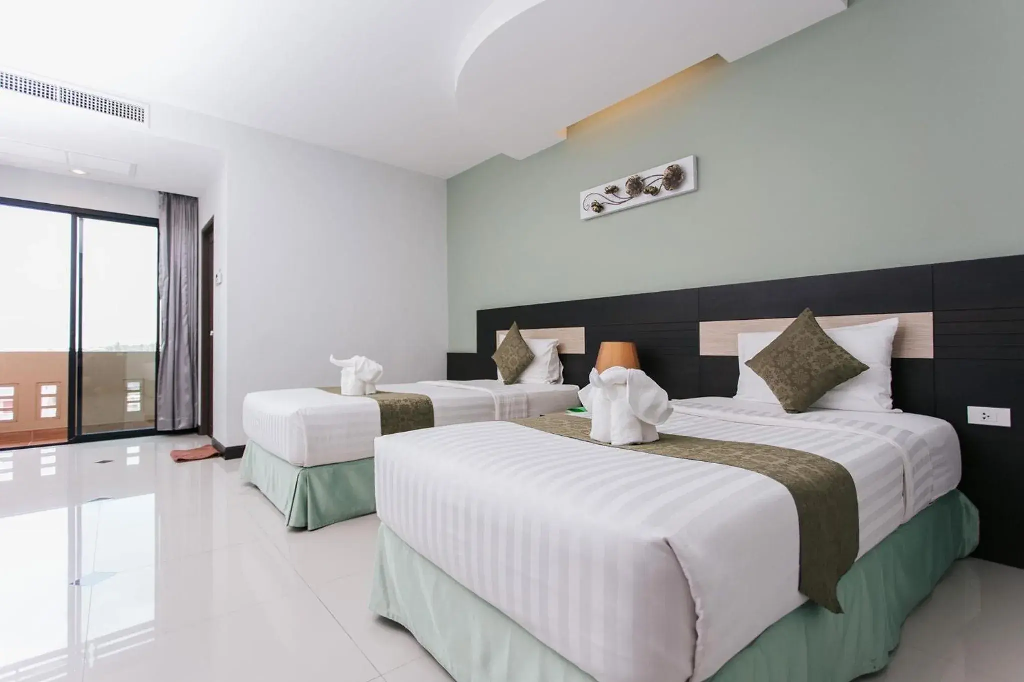 Deluxe Twin Room in The Centris Hotel Phatthalung Deluxe Twin Room in The Centris Hotel Phatthalung