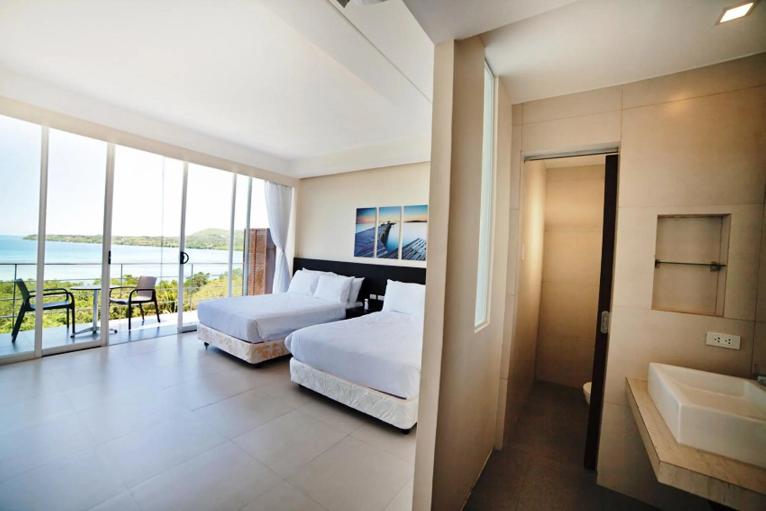 Decorative detail, Bed in Ocean Suites Bohol Boutique Hotel