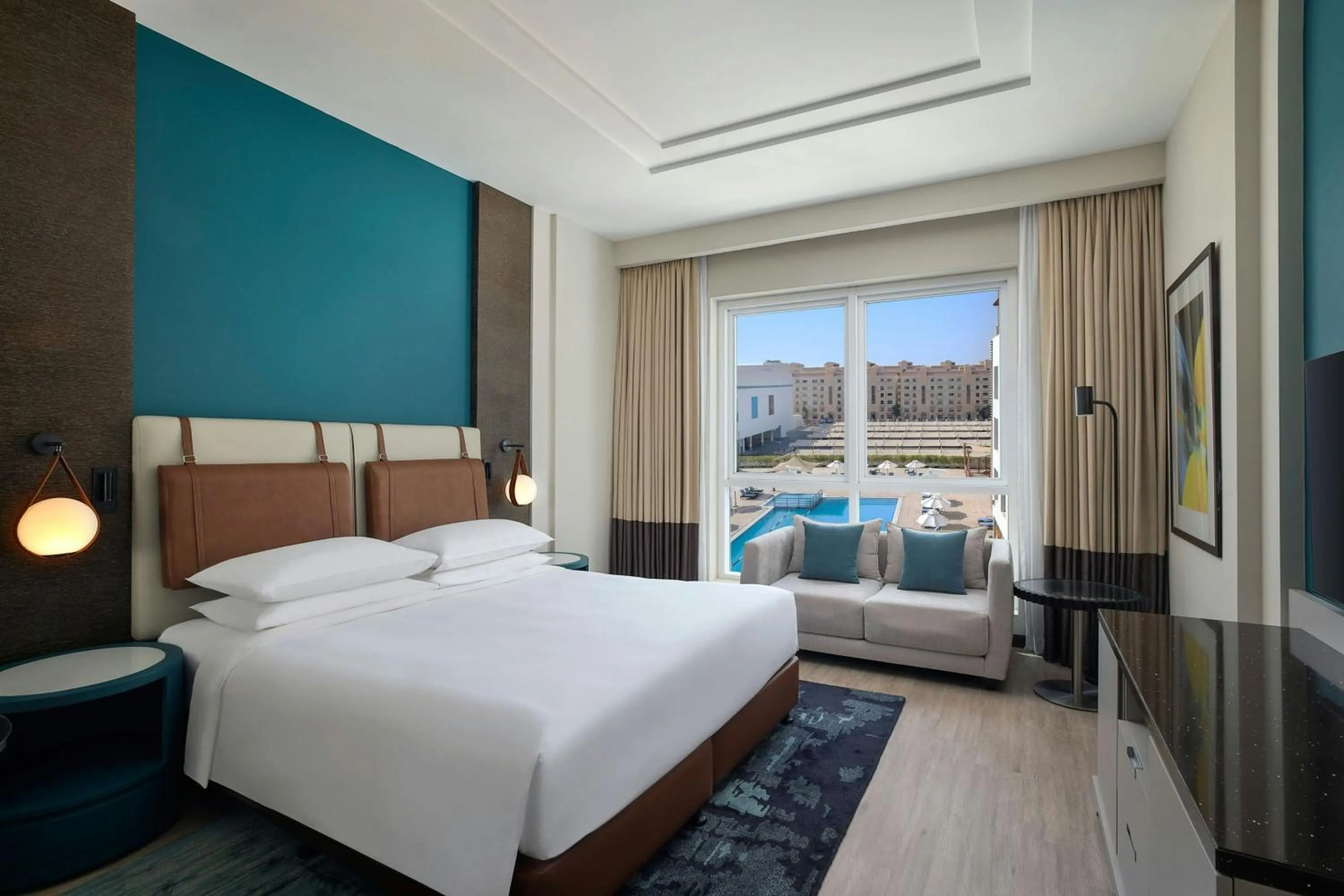 Swimming pool, Bed in Four Points by Sheraton Al Ain