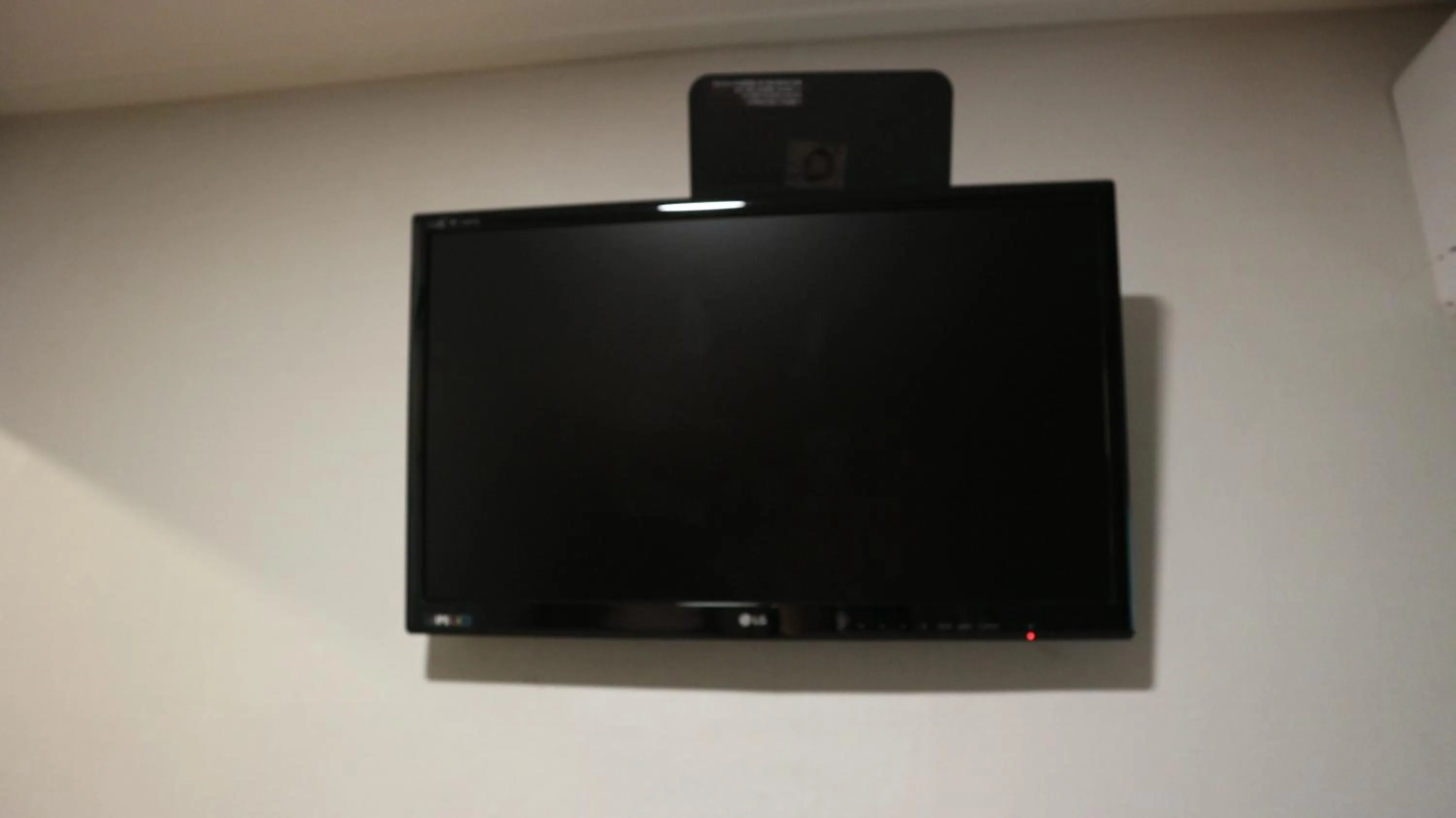 TV and multimedia in Zzzip Guesthouse in Hongdae