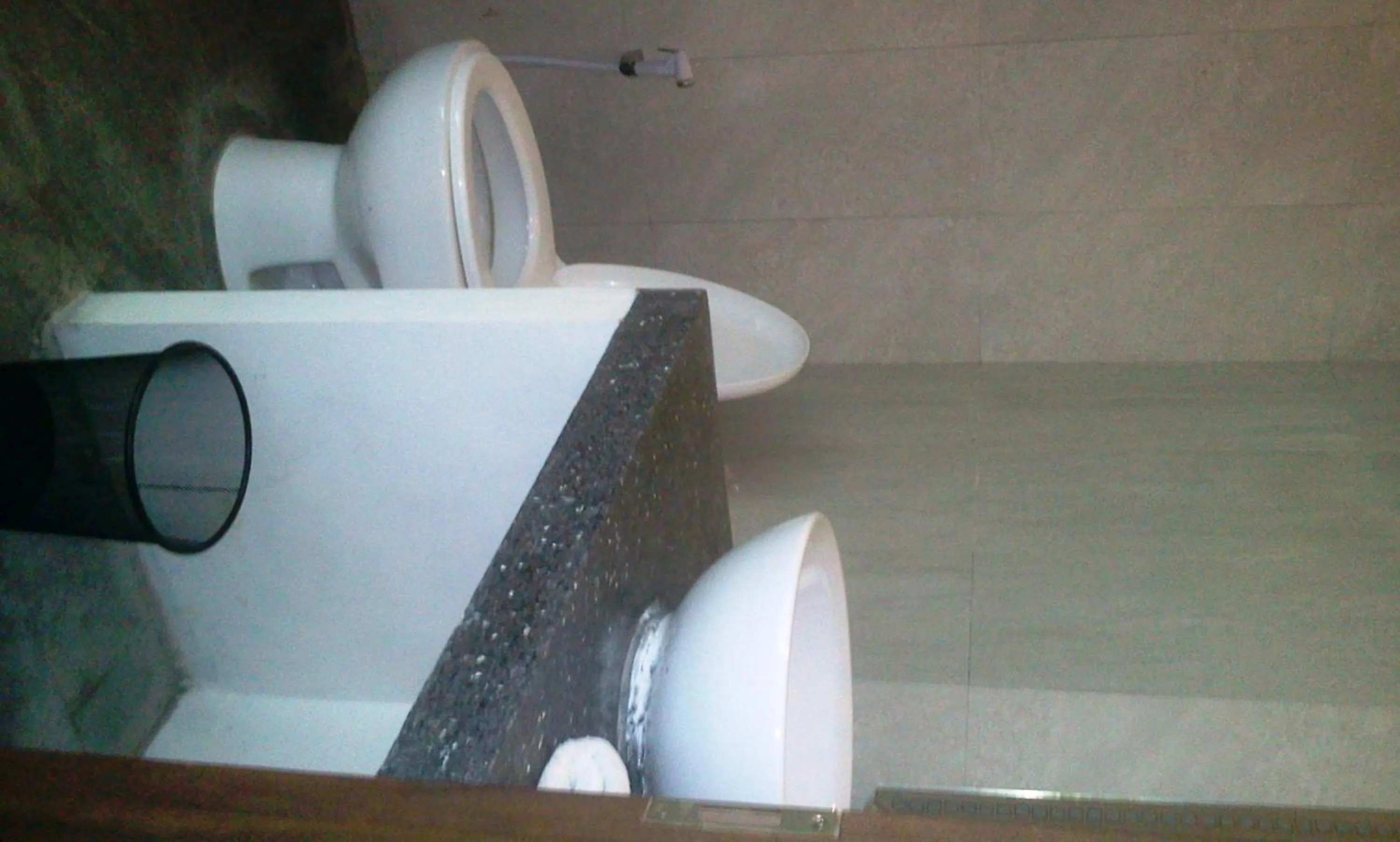 Toilet in Delu Villas & Suite