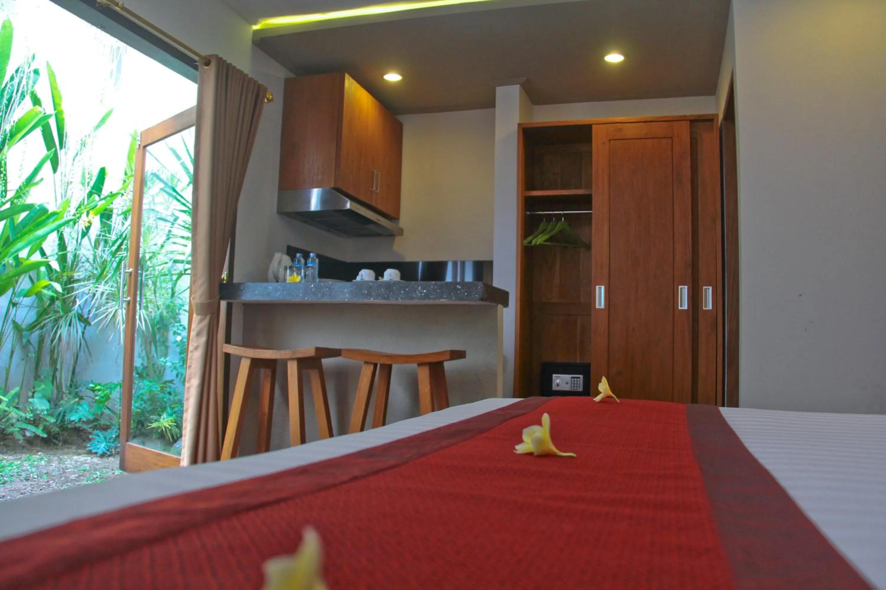 Bedroom in Delu Villas & Suite