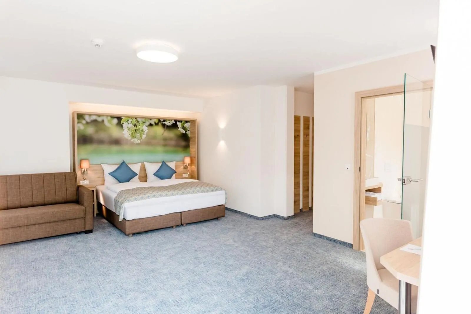 Bed in R&R Residenzen HOTEL