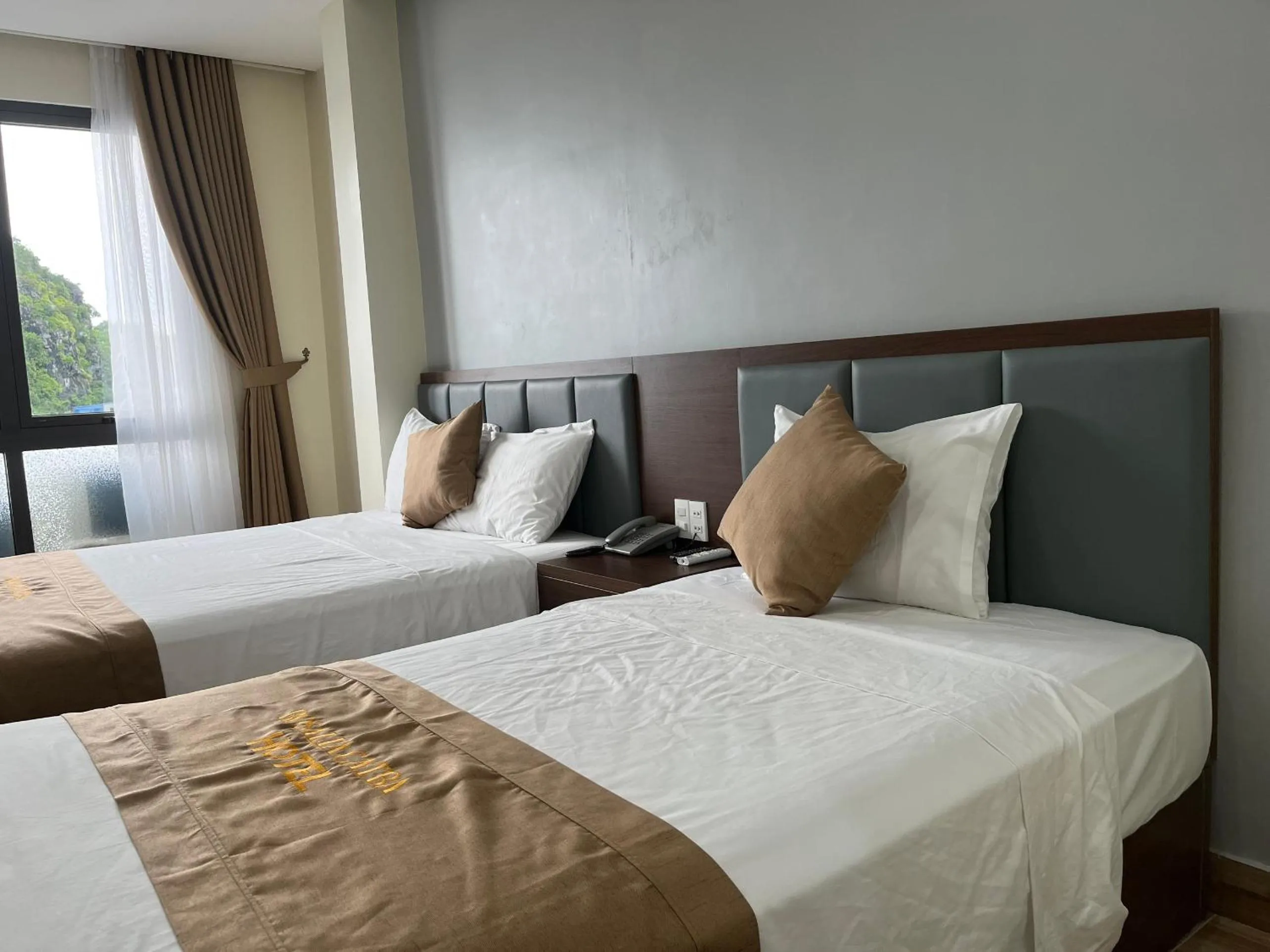 Bed in CAT BA ROSALIA HOTEL