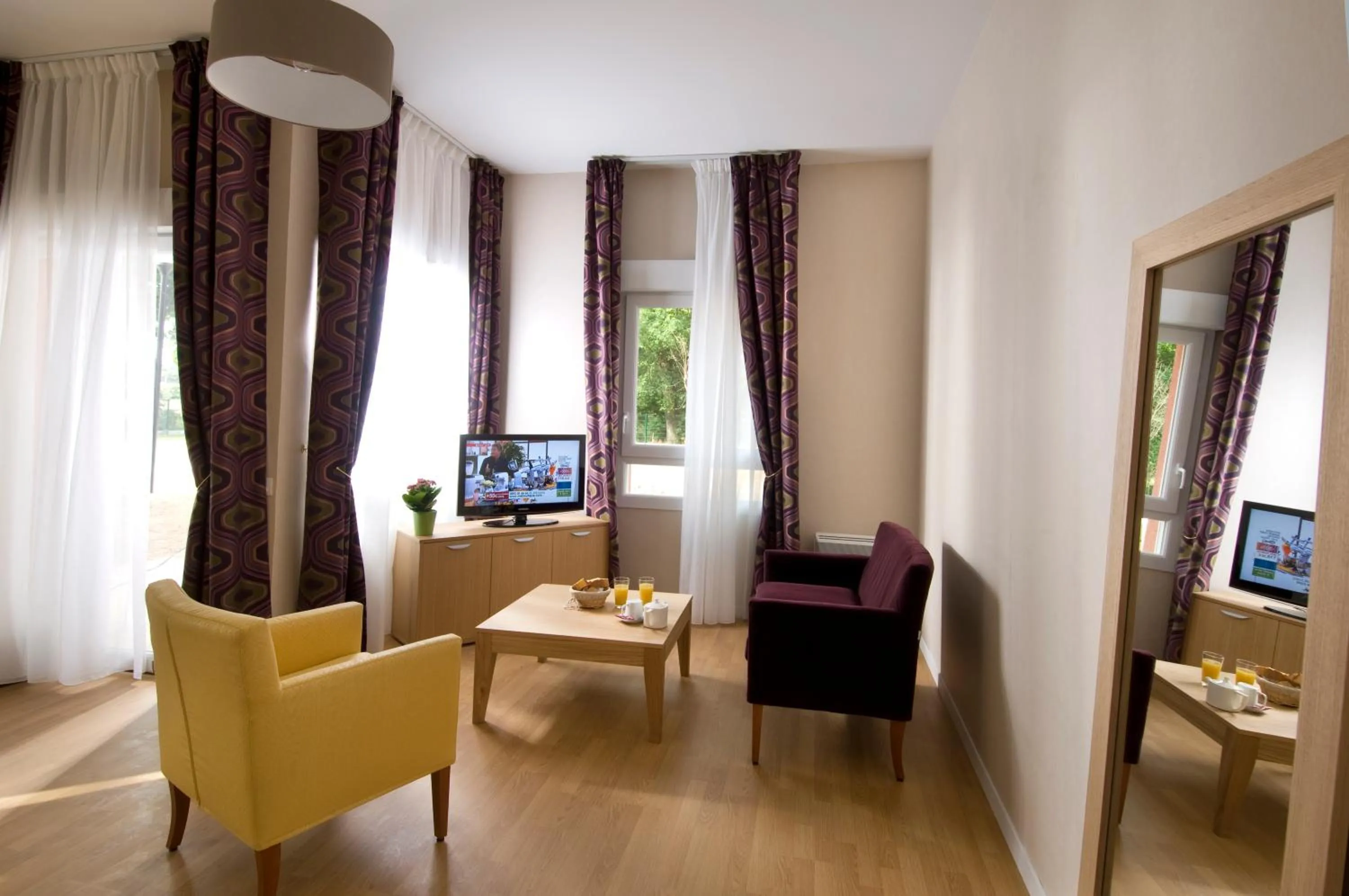 Living room in Domitys Le Parc Saint Germain