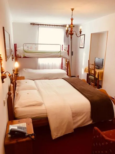 Bed in Hotel Paradiso