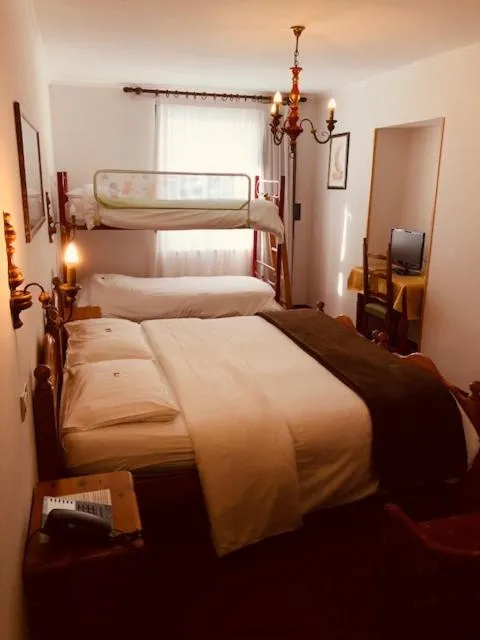 Bed in Hotel Paradiso