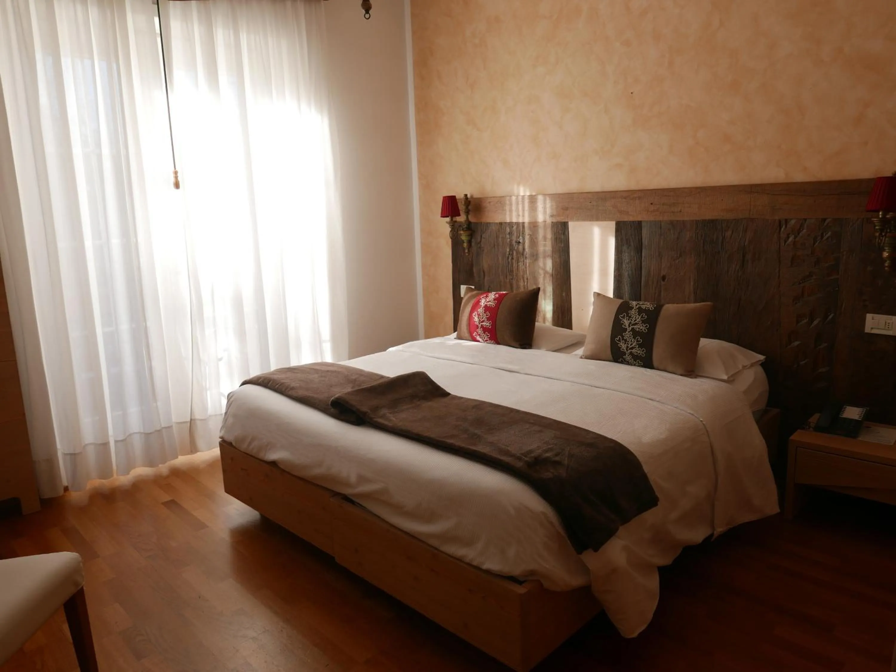 Bed in Hotel Paradiso