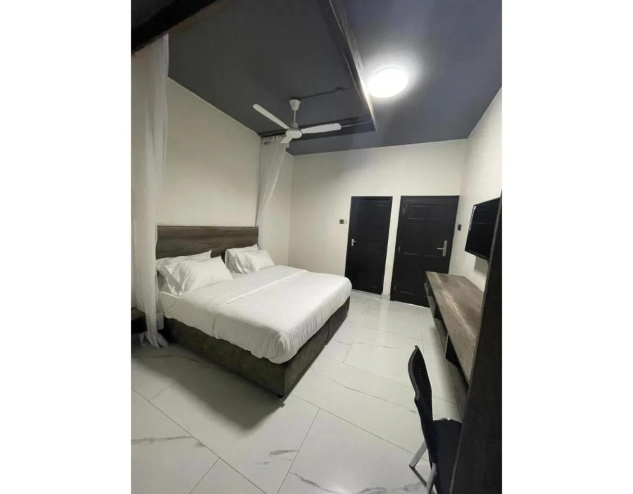 Bed in The Ivory Suites