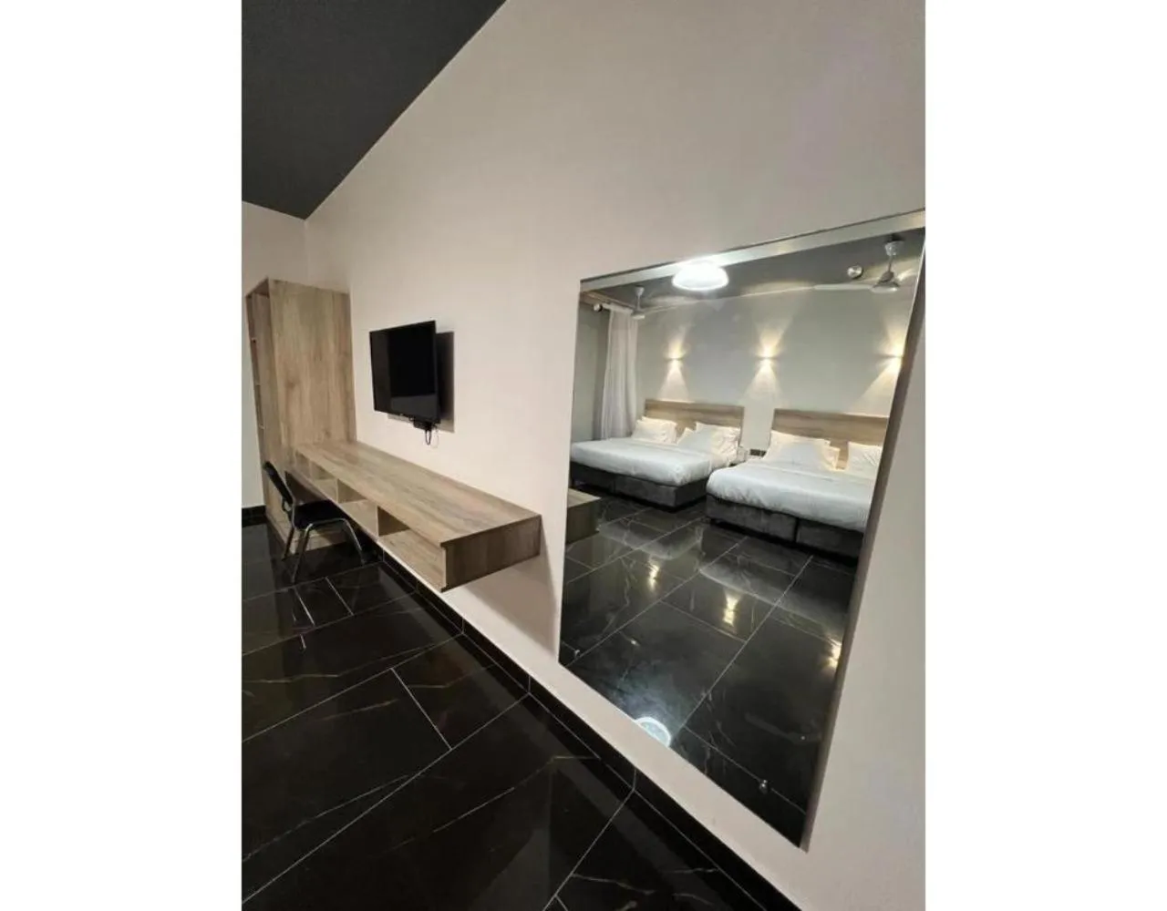 Bed in The Ivory Suites