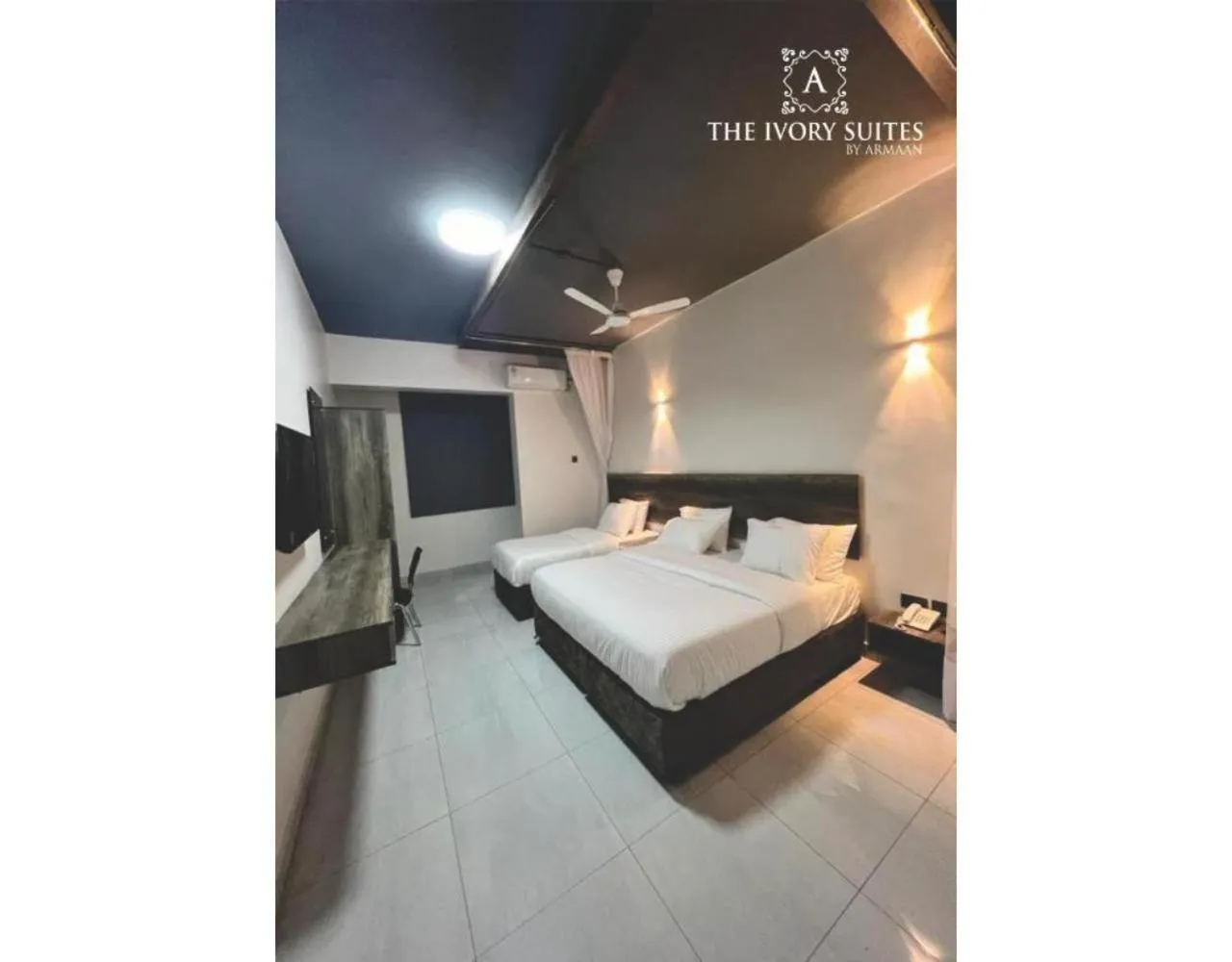 Bed in The Ivory Suites