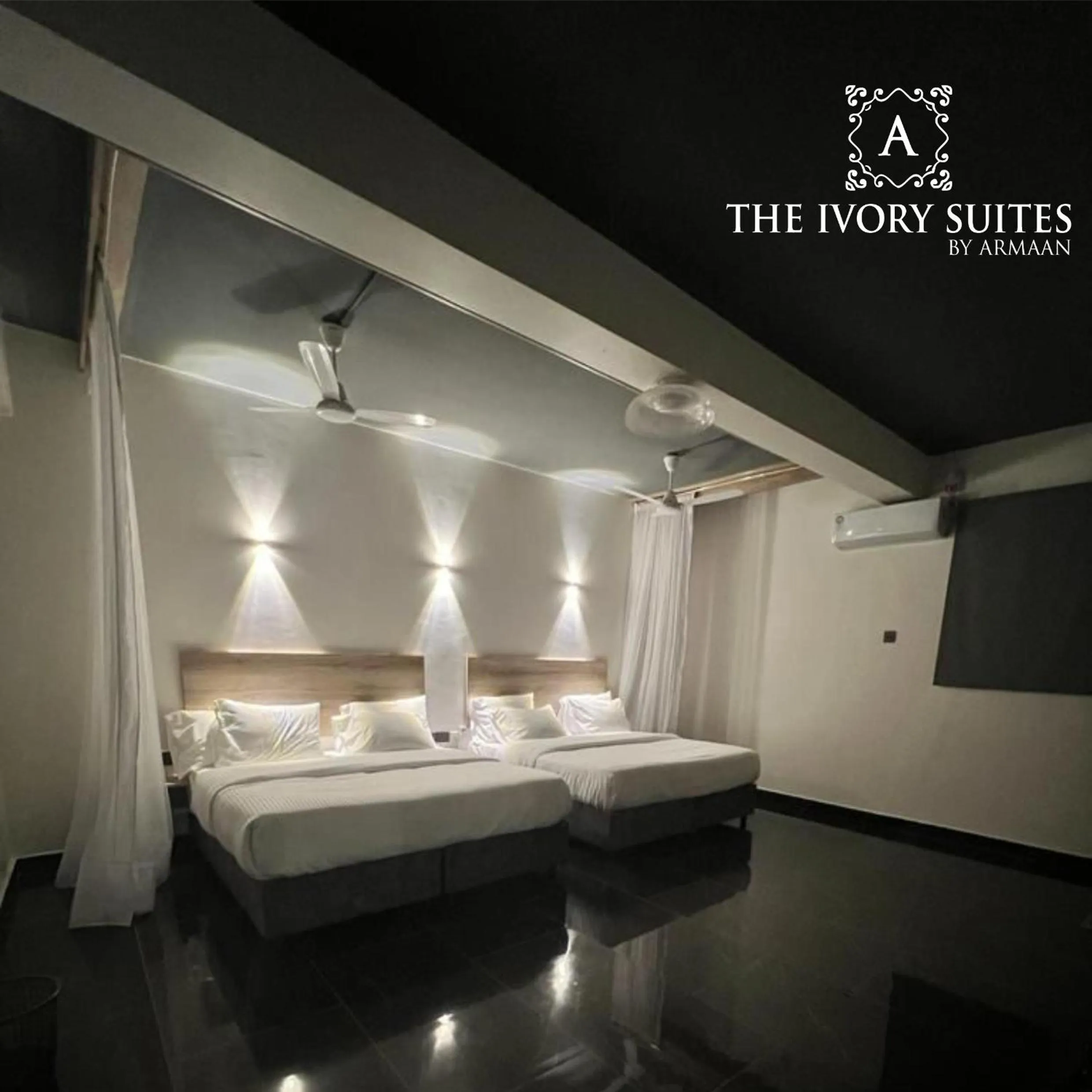 Bed in The Ivory Suites