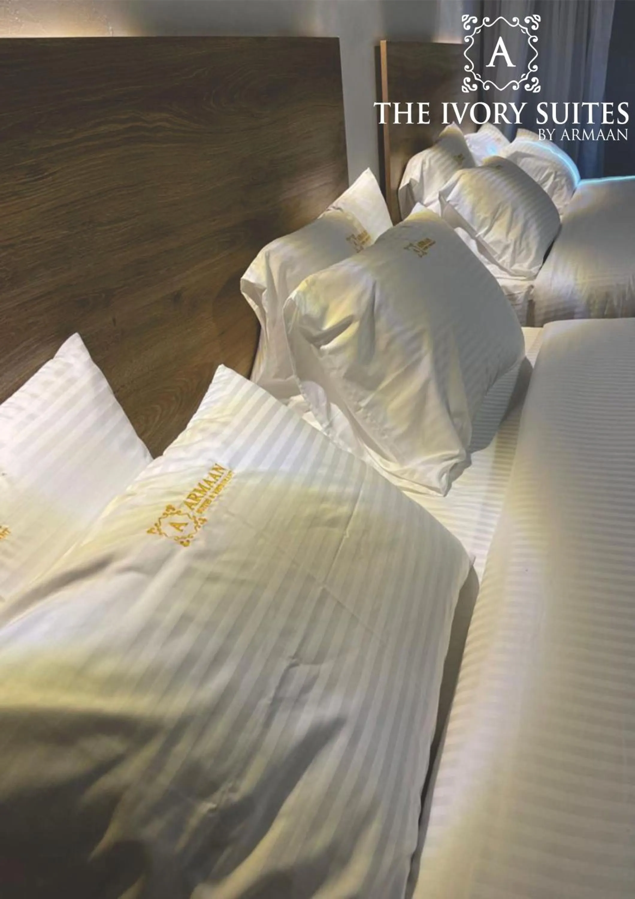 Bed in The Ivory Suites