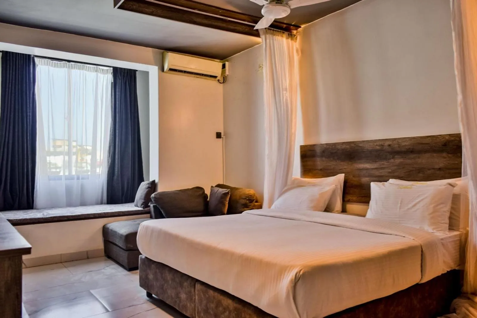 Bed in The Ivory Suites