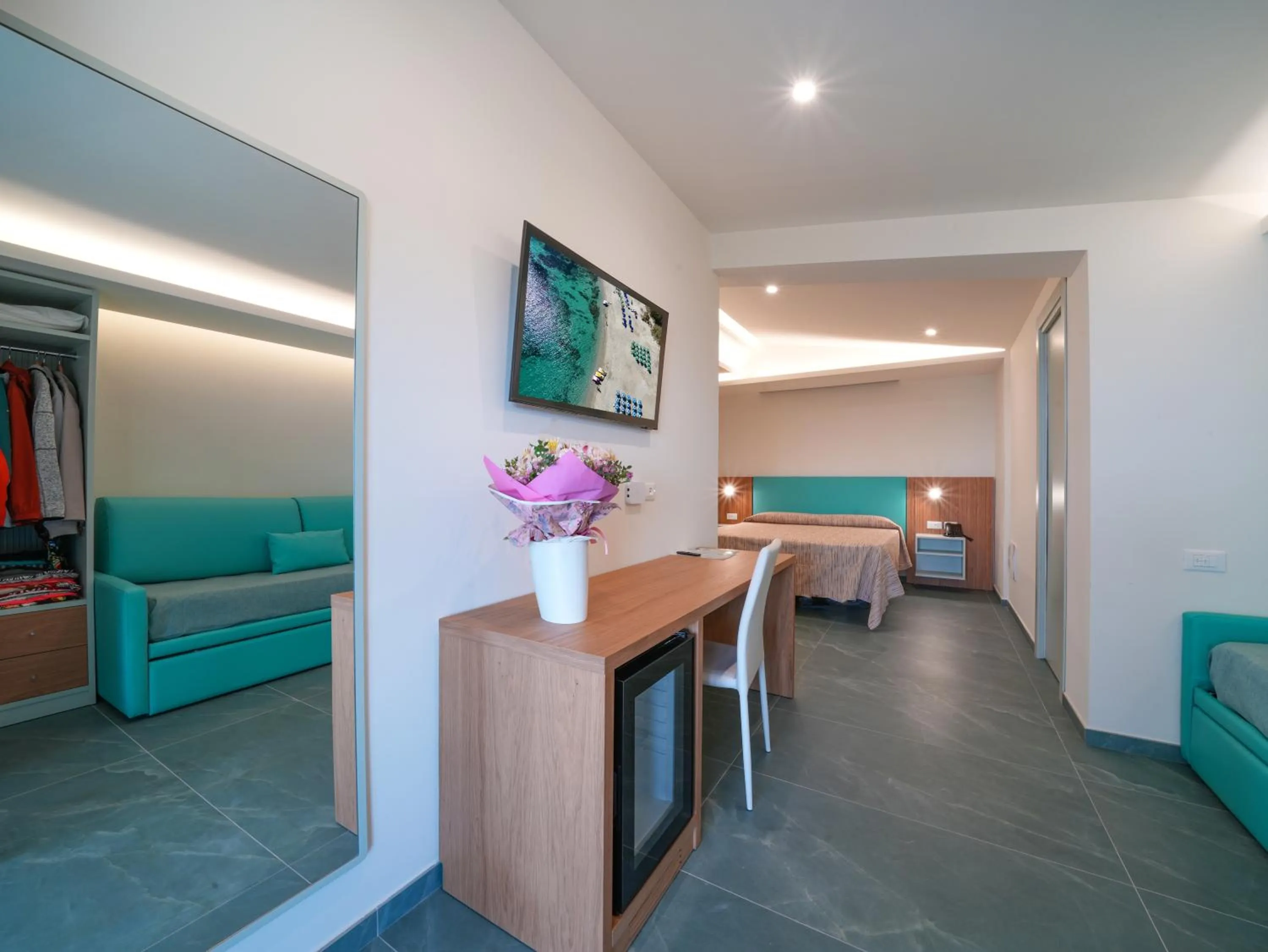 Photo of the whole room, Bed in Hotel MARINELLA parking wi-fi spiaggia attrezzata