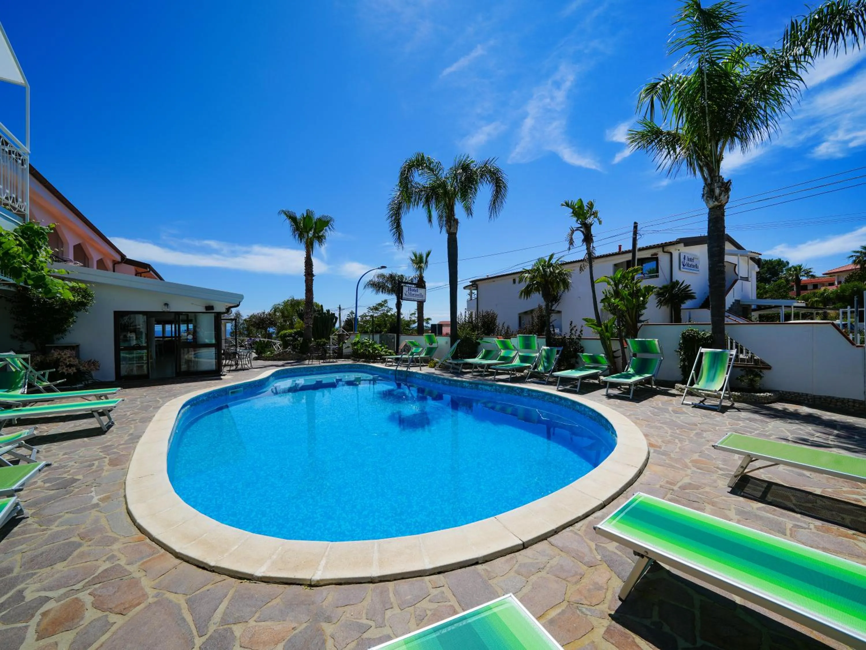 Property building in Hotel MARINELLA parking wi-fi spiaggia attrezzata