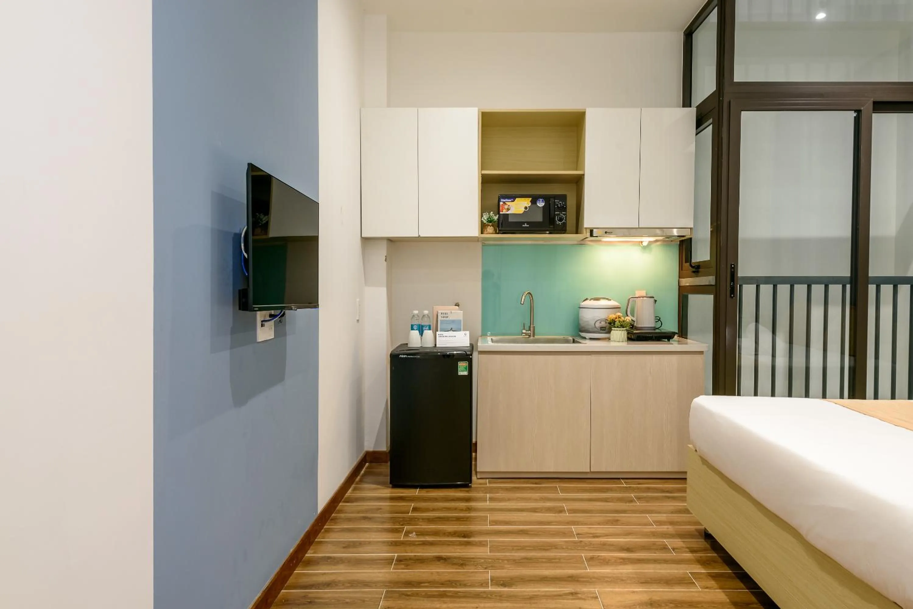 Kitchen or kitchenette, Bed in Cozrum Homes - June Corner