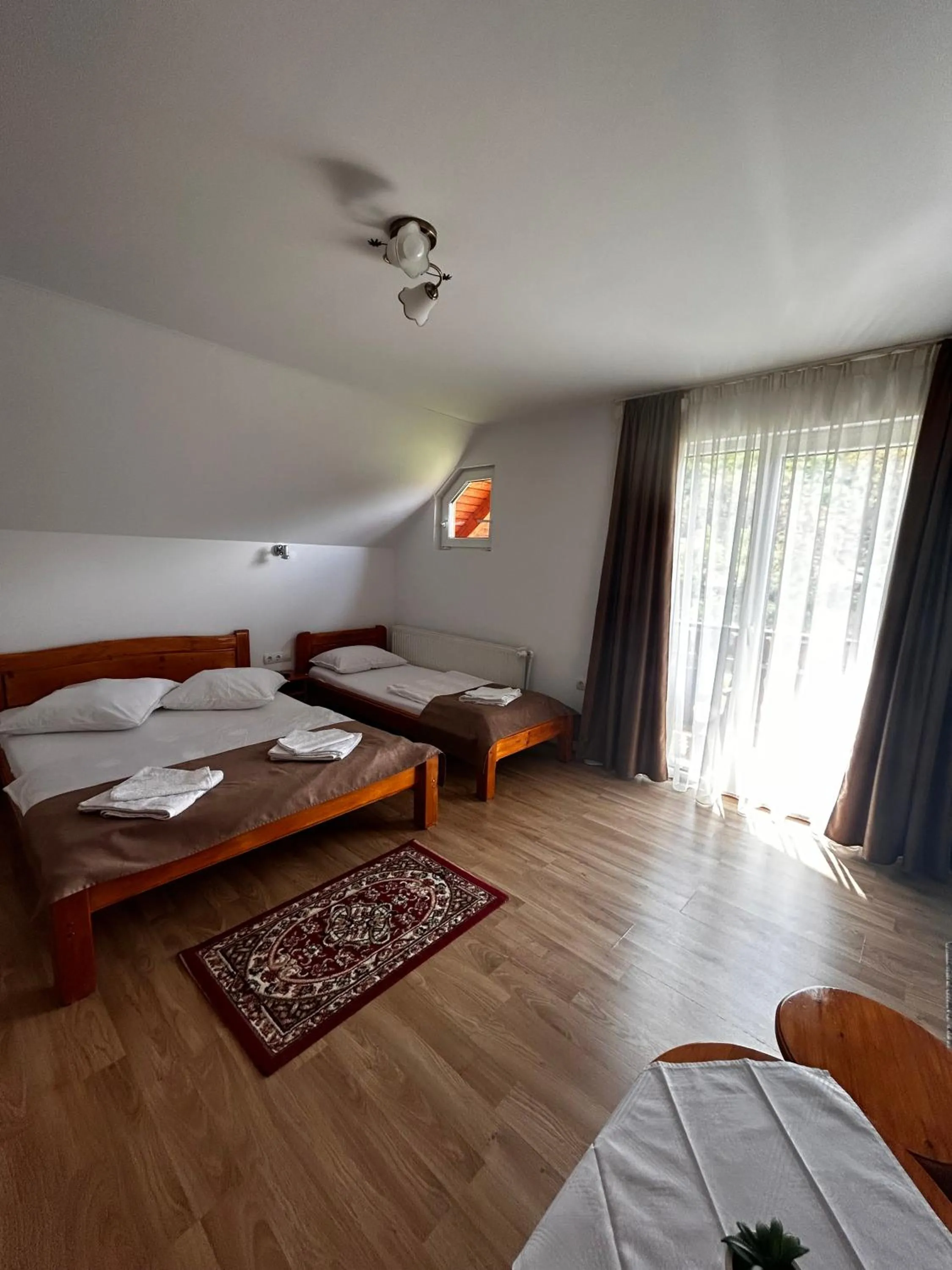 Bed in PENSIUNEA KELEMEN