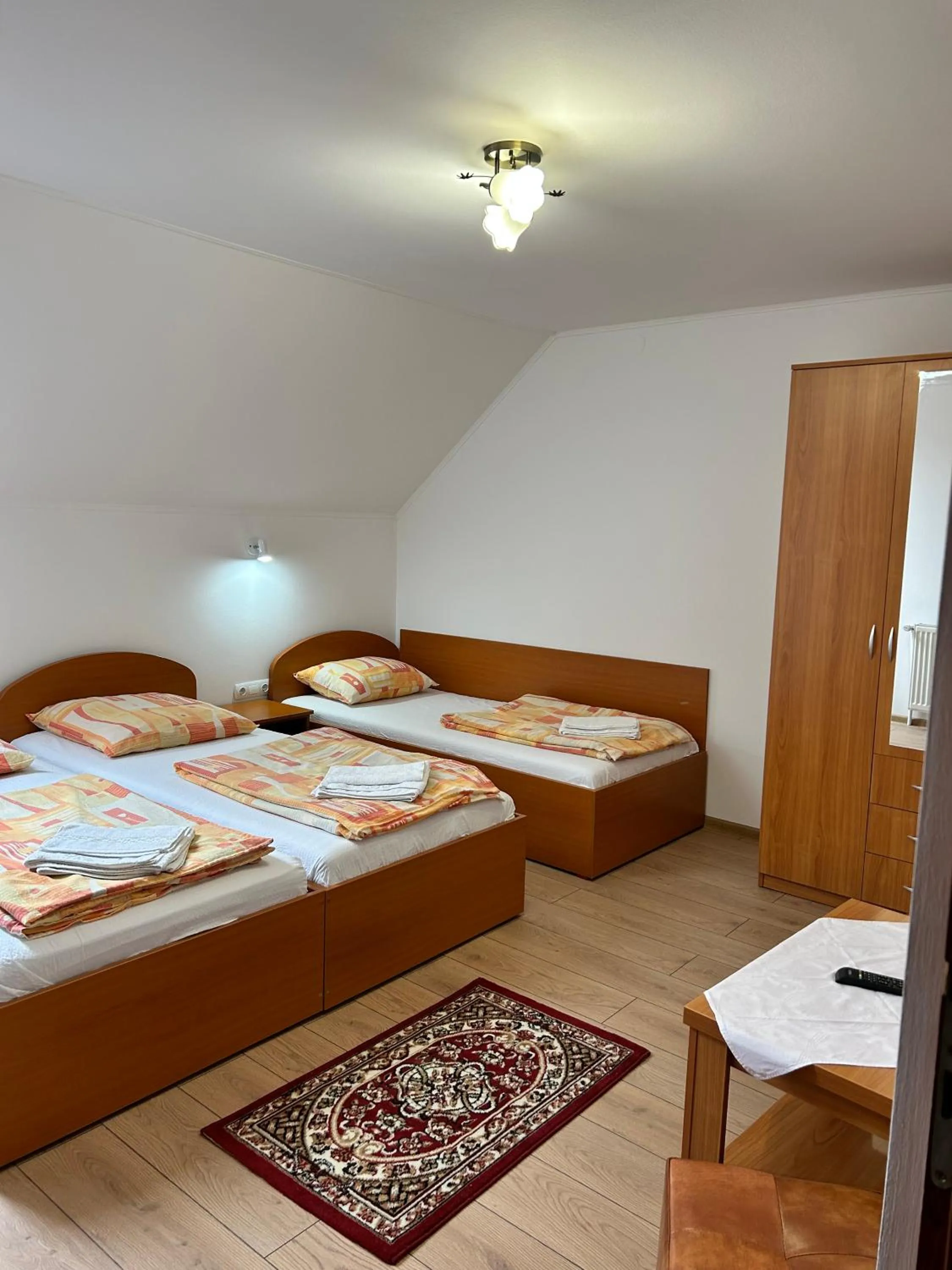 Bed in PENSIUNEA KELEMEN