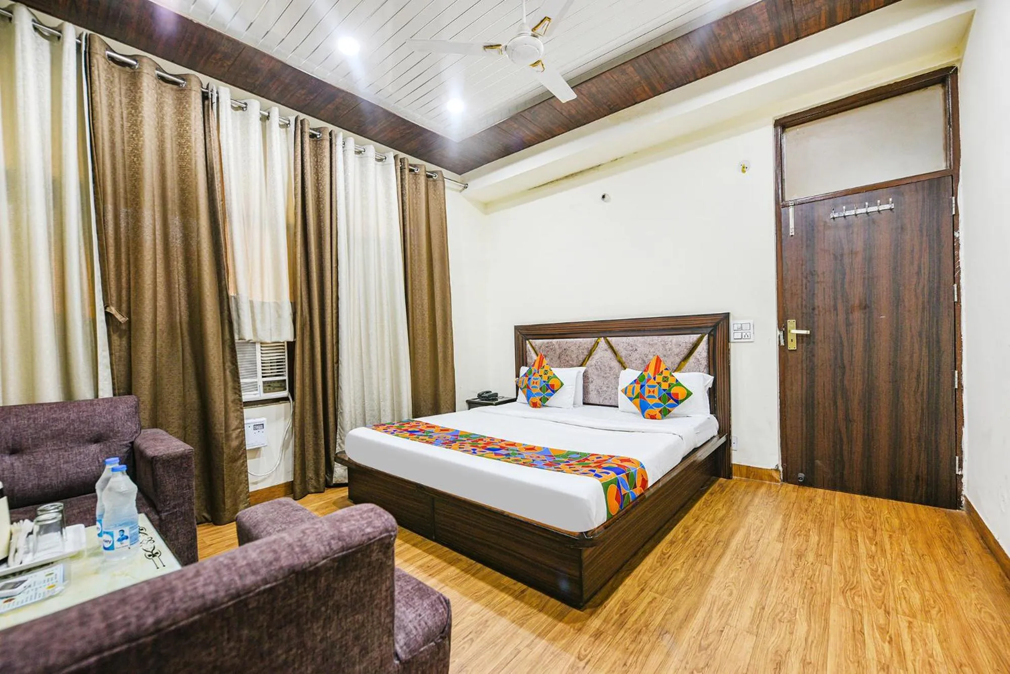 Bed in FabHotel Royal Inn