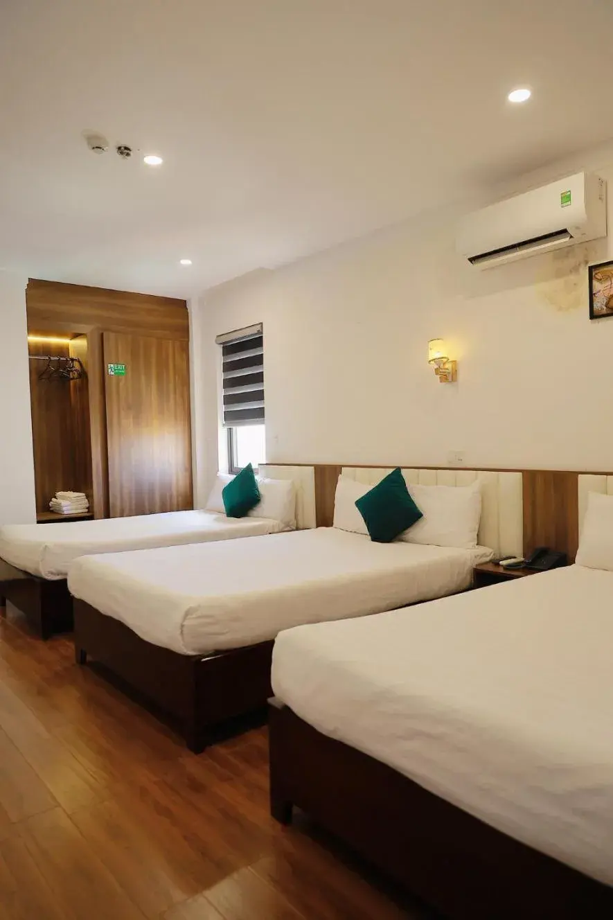 Deluxe Triple Room in Le Centre Pleiku Hotel Deluxe Triple Room in Le Centre Pleiku Hotel