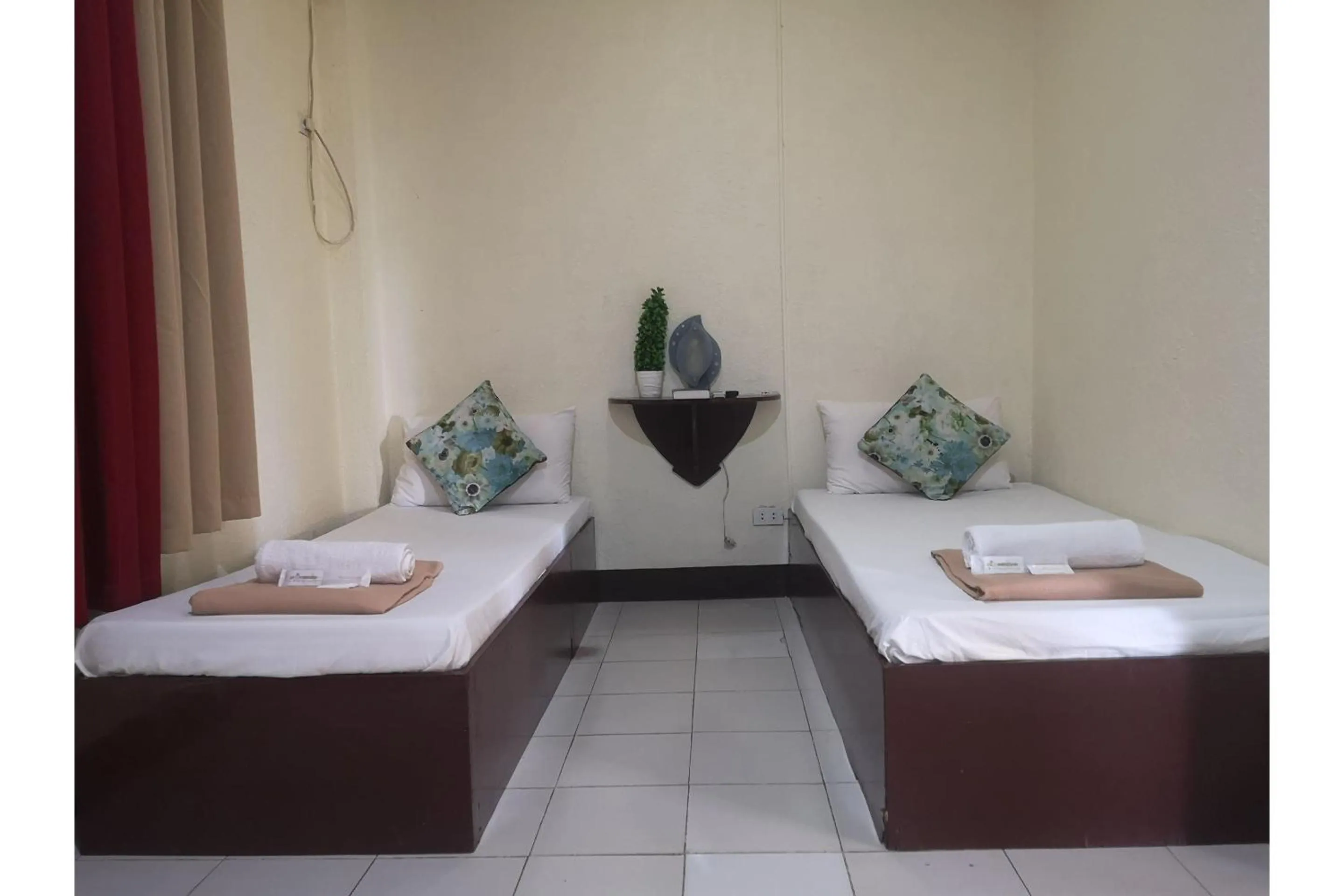 Bedroom in OYO 880 Flores De Musa Inn