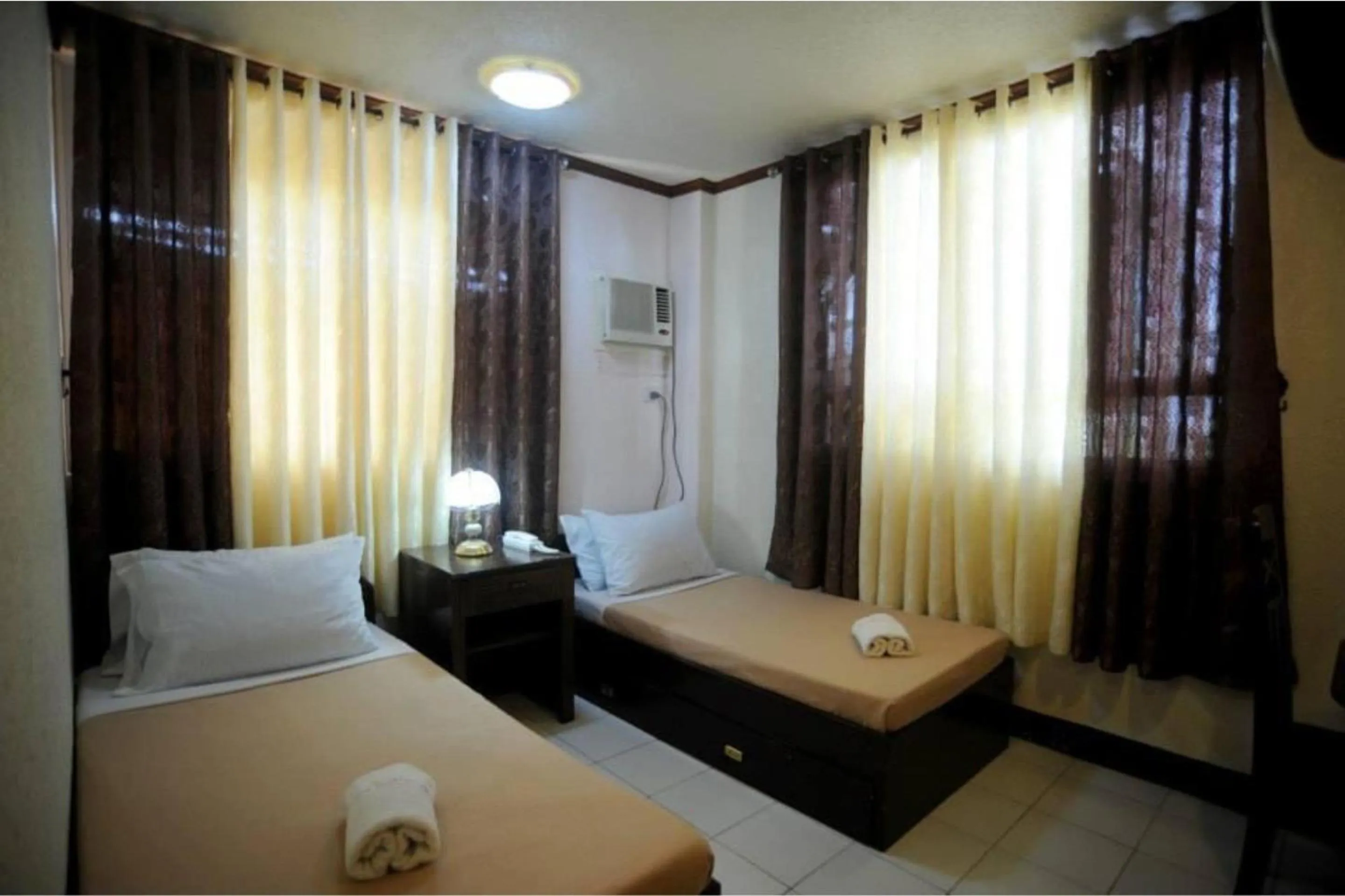 Bedroom in OYO 880 Flores De Musa Inn