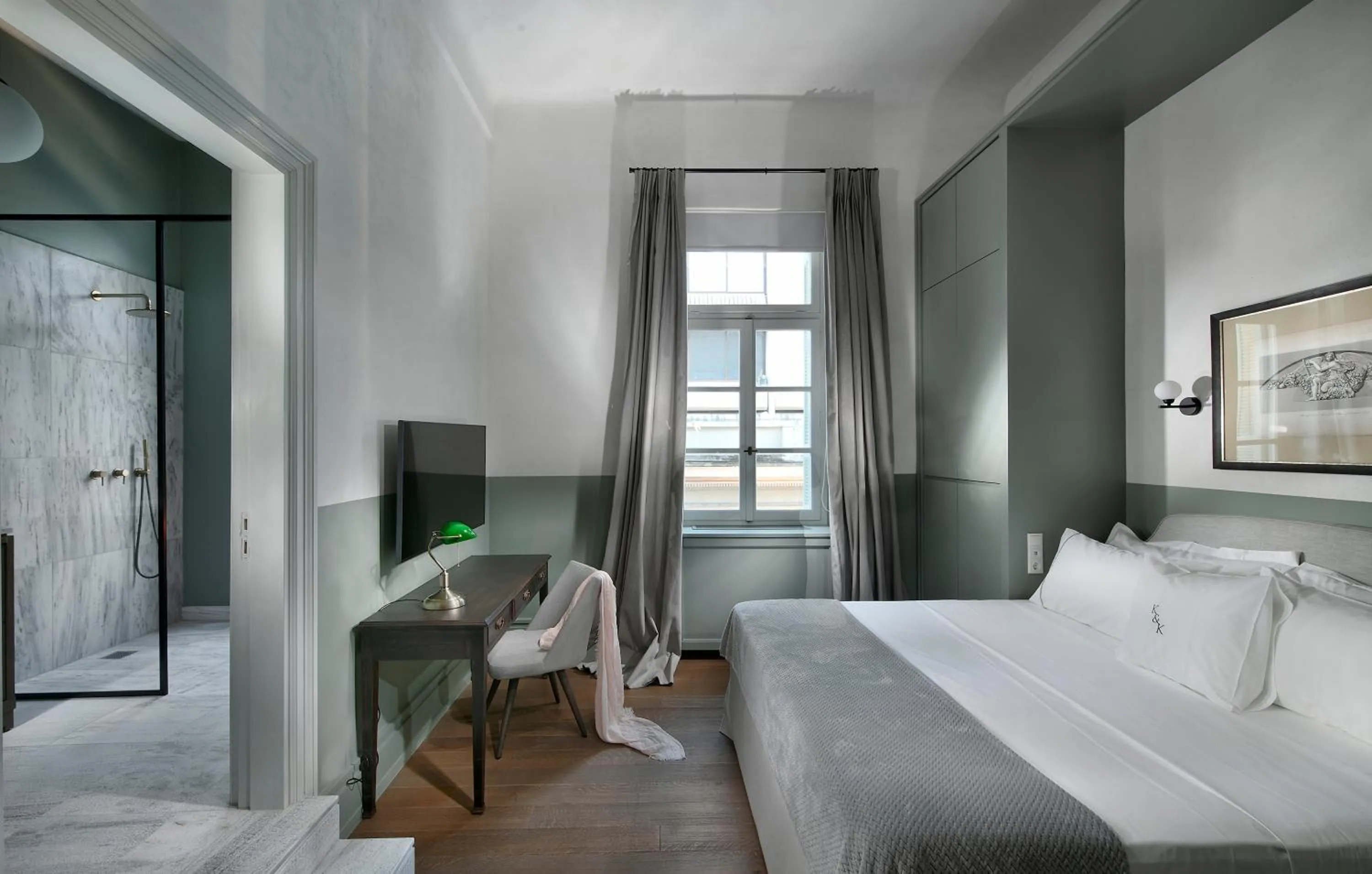 Photo of the whole room, Bed in ATHINAIDOS QUARTERS by K&K