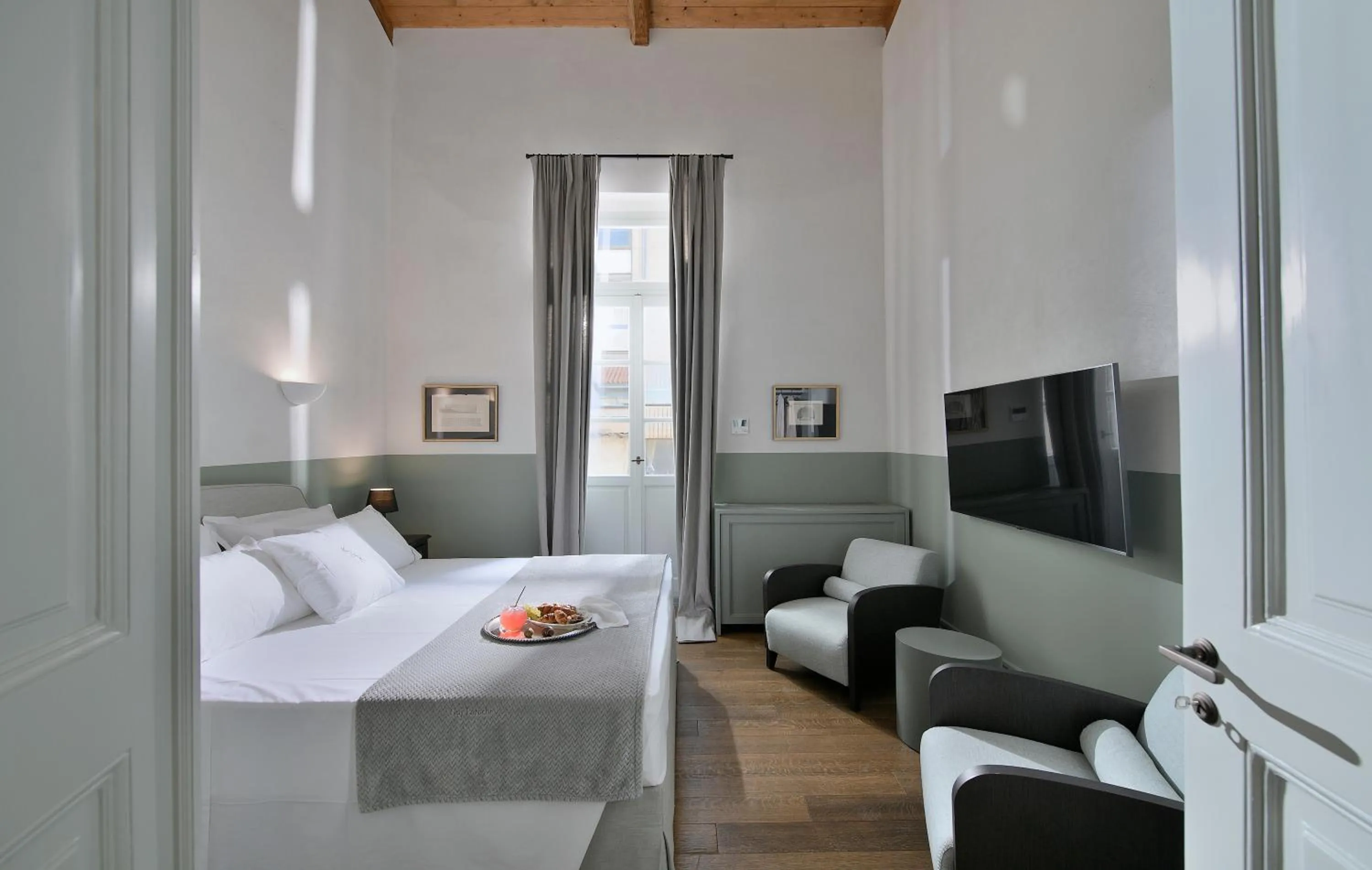 Photo of the whole room, Bed in ATHINAIDOS QUARTERS by K&K