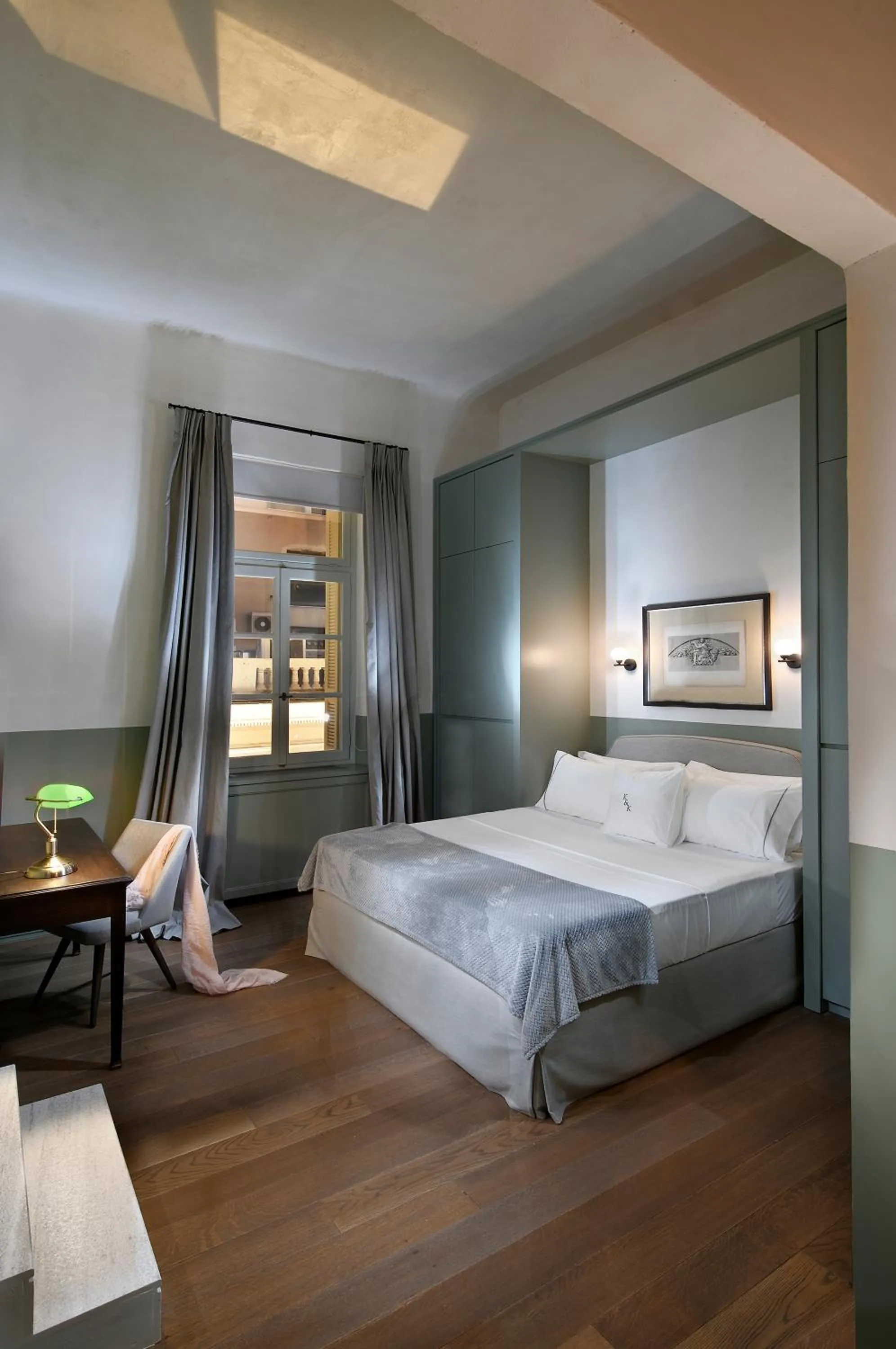 Photo of the whole room, Bed in ATHINAIDOS QUARTERS by K&K