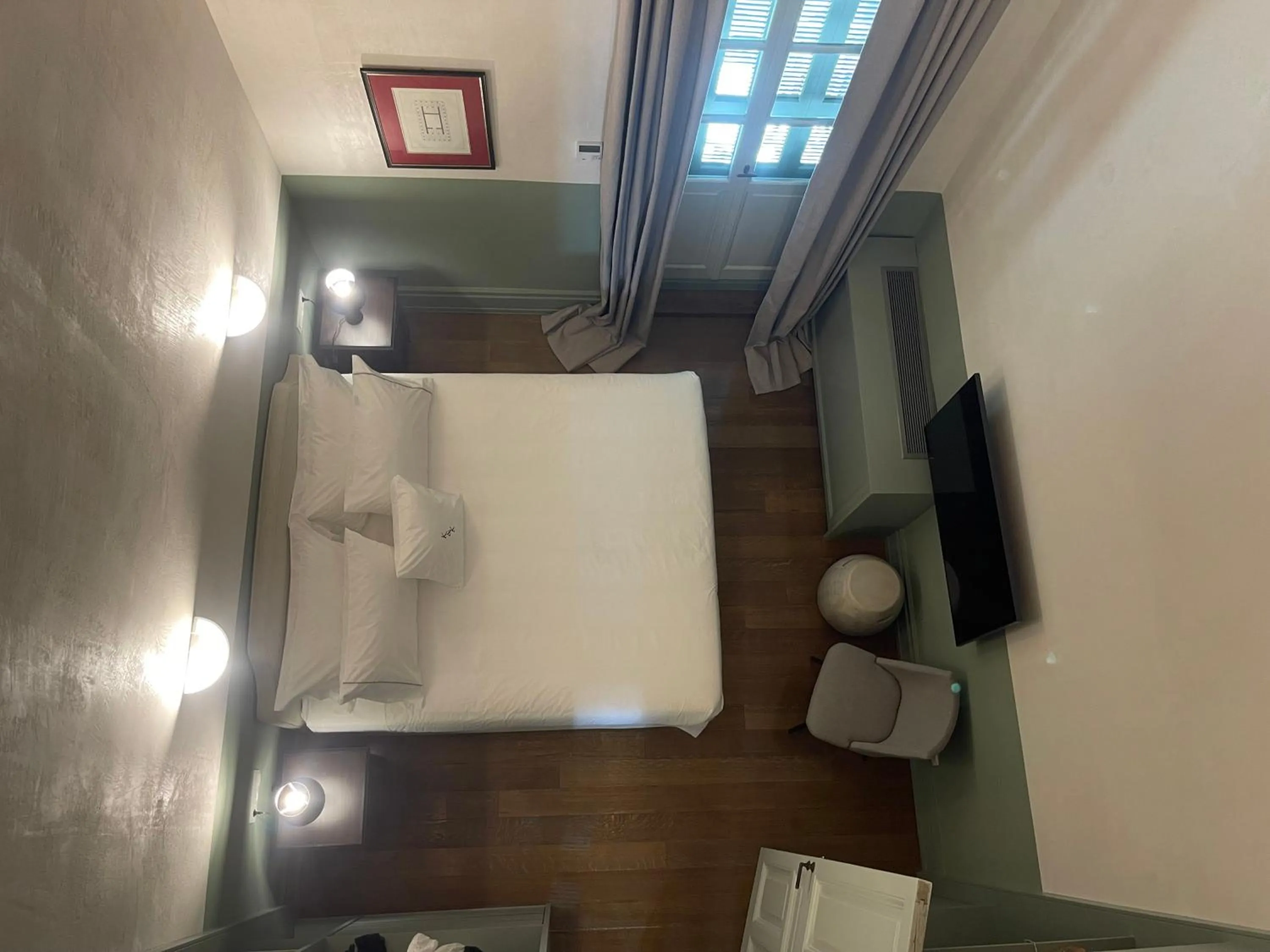 Bedroom in ATHINAIDOS QUARTERS by K&K