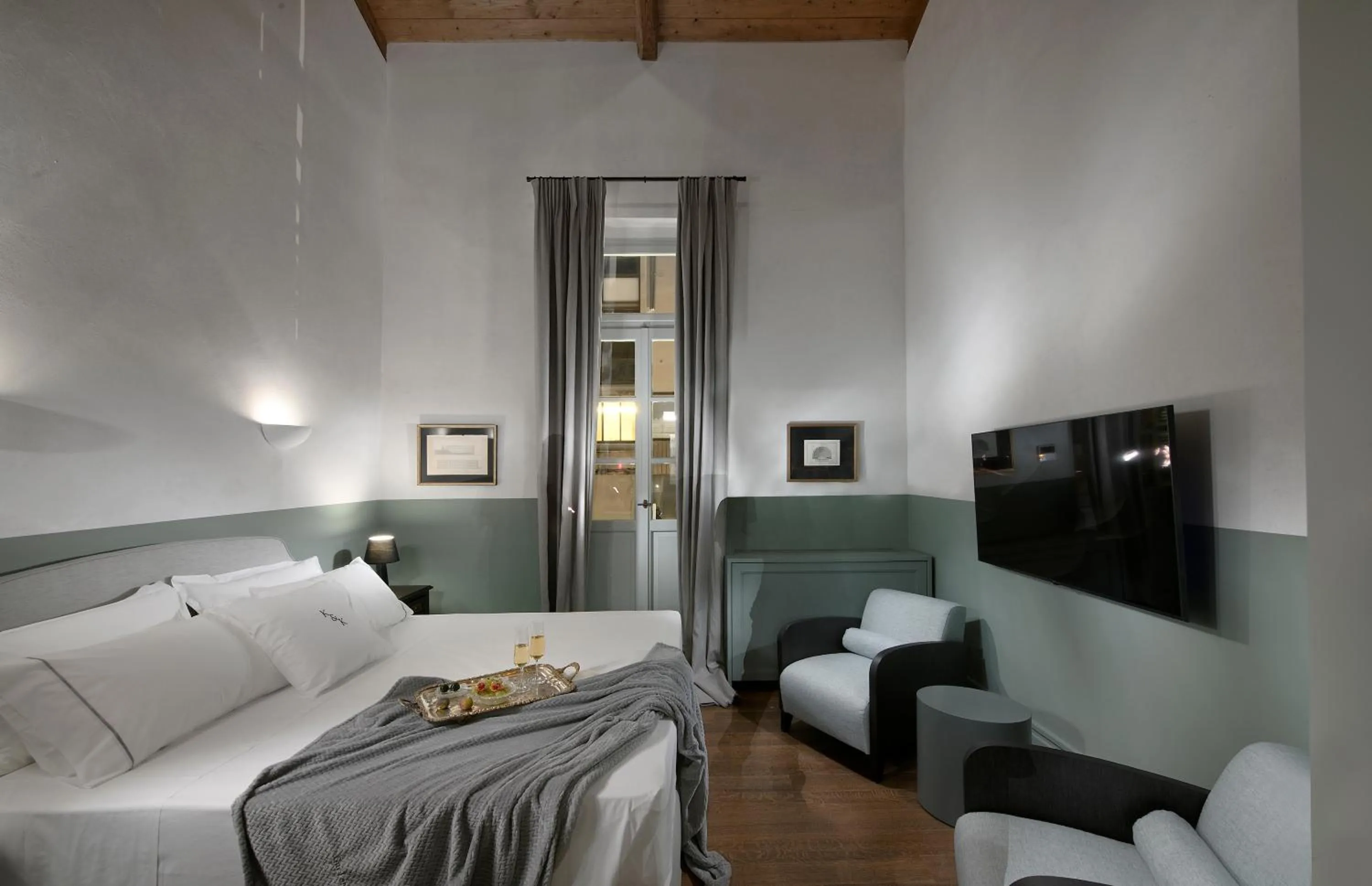 Photo of the whole room, Bed in ATHINAIDOS QUARTERS by K&K