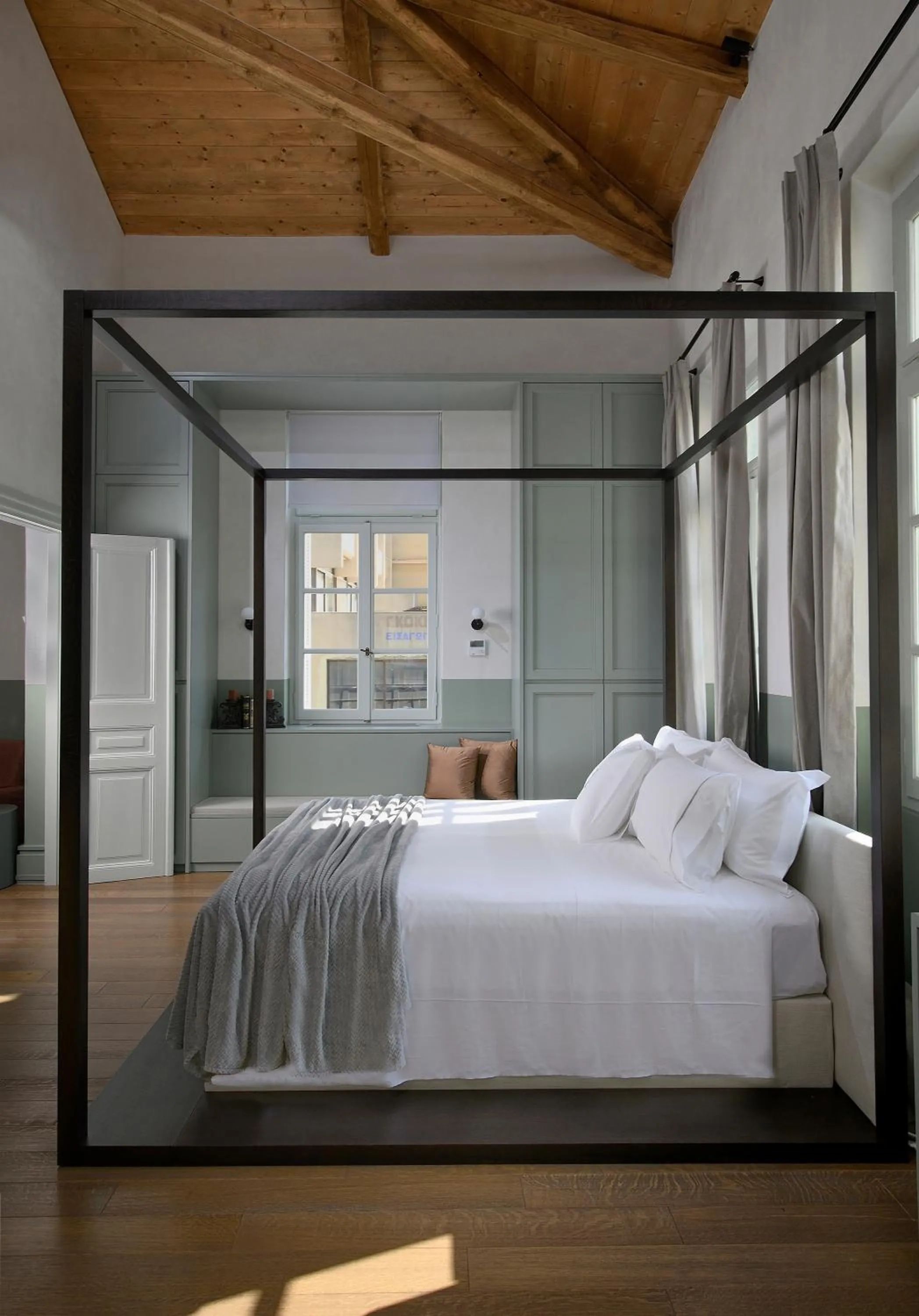 Photo of the whole room, Bed in ATHINAIDOS QUARTERS by K&K