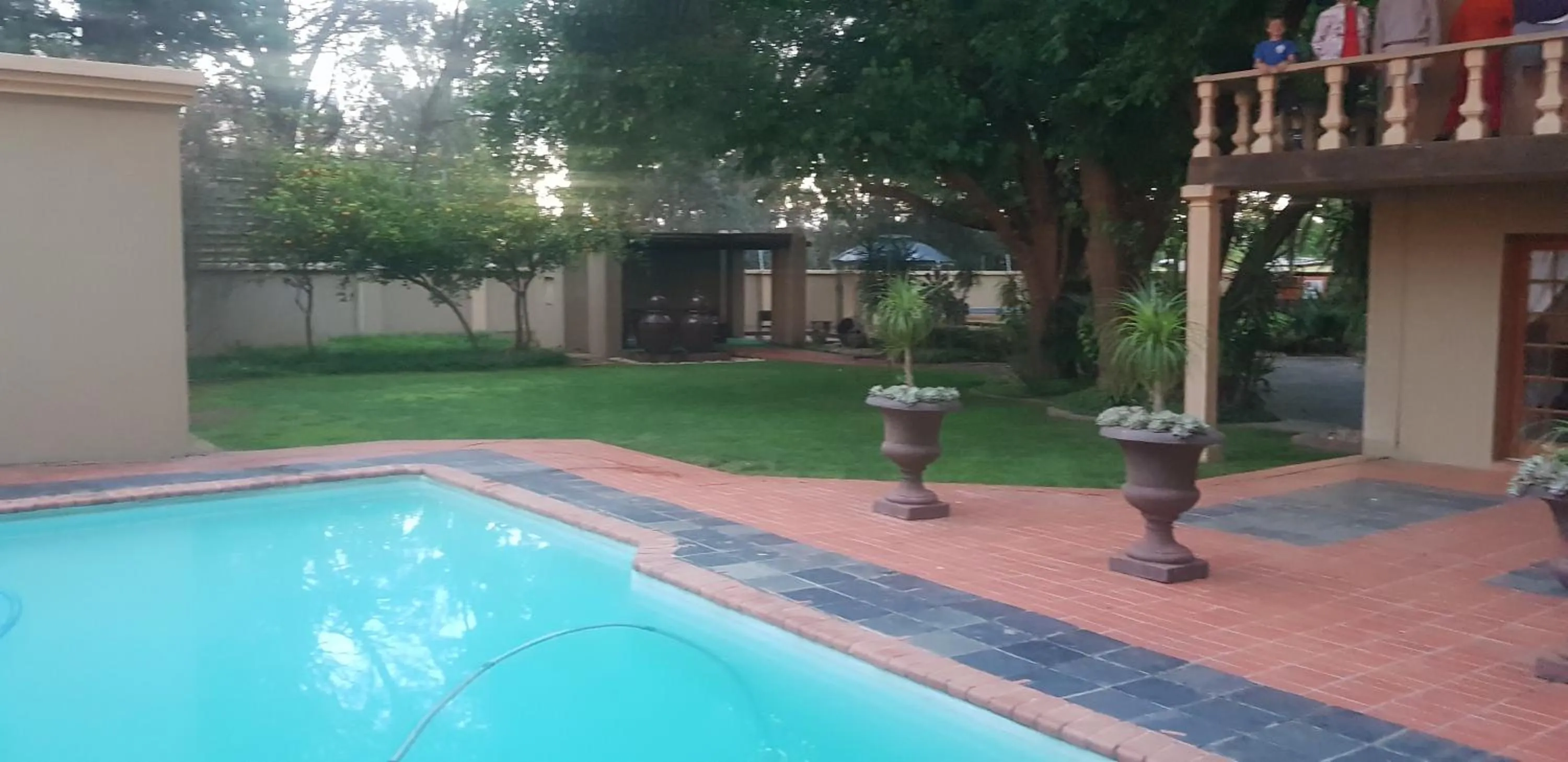 Swimming pool in De Stallen Guest Villas and Golf Course