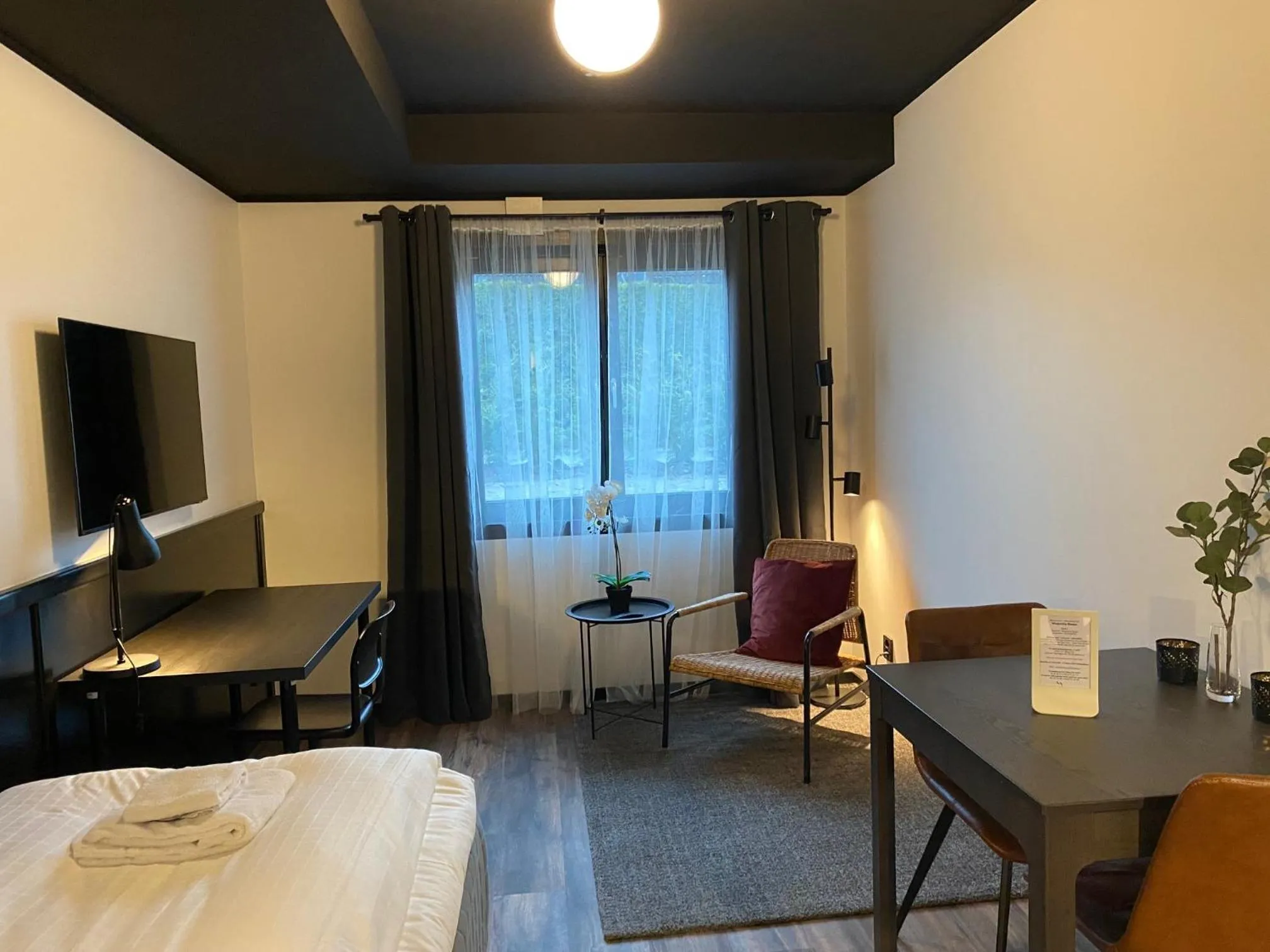 Seating area, Bed in Magnolia House Sollentuna