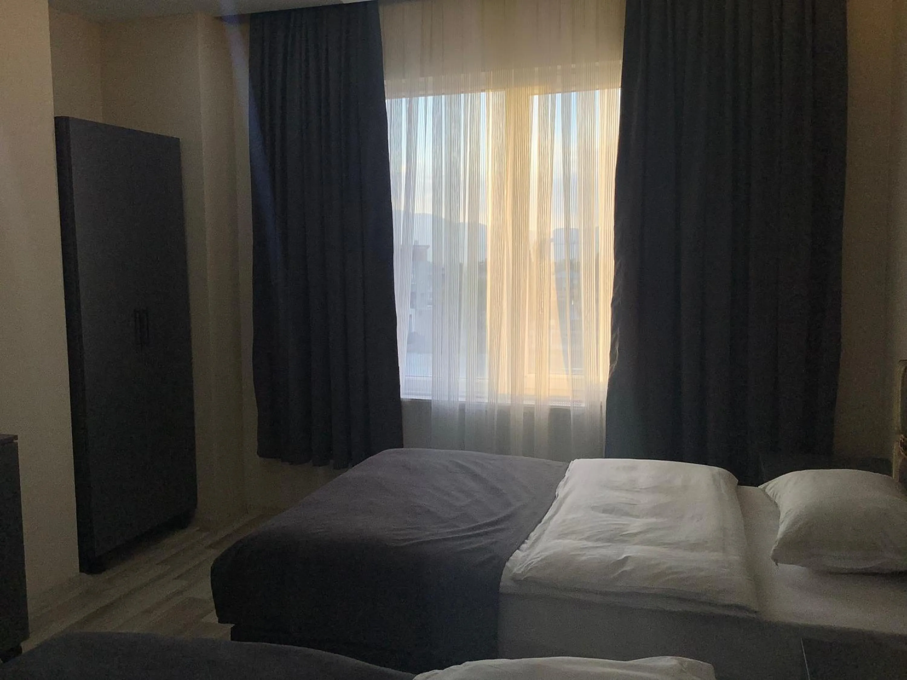 Bed in ATLIHAN PLUS HOTEL