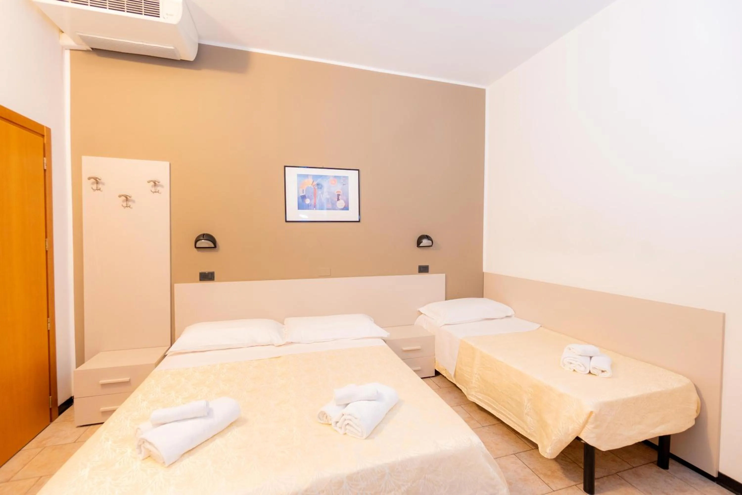 Bed in Hotel Galileo