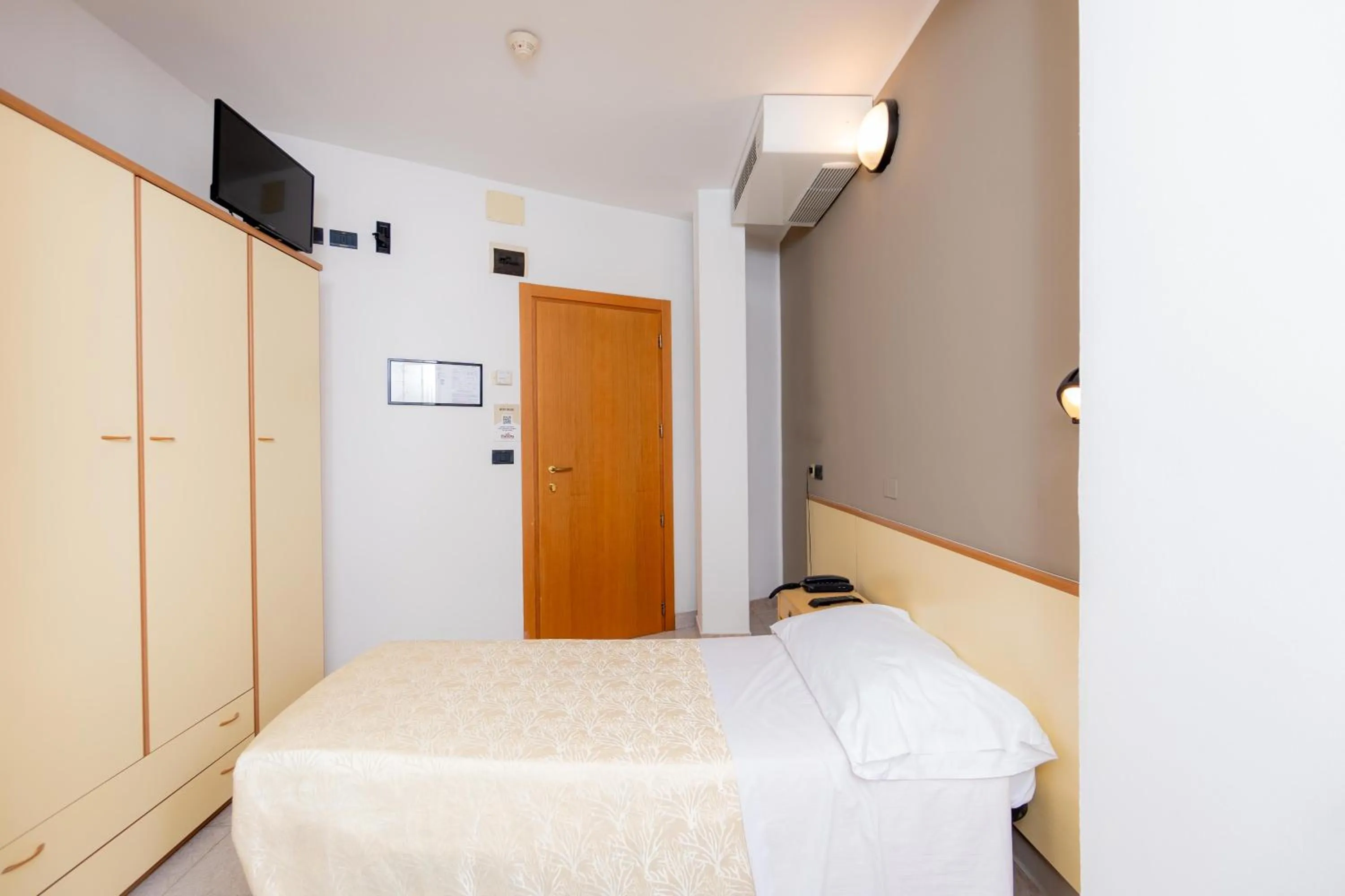 Bed in Hotel Galileo