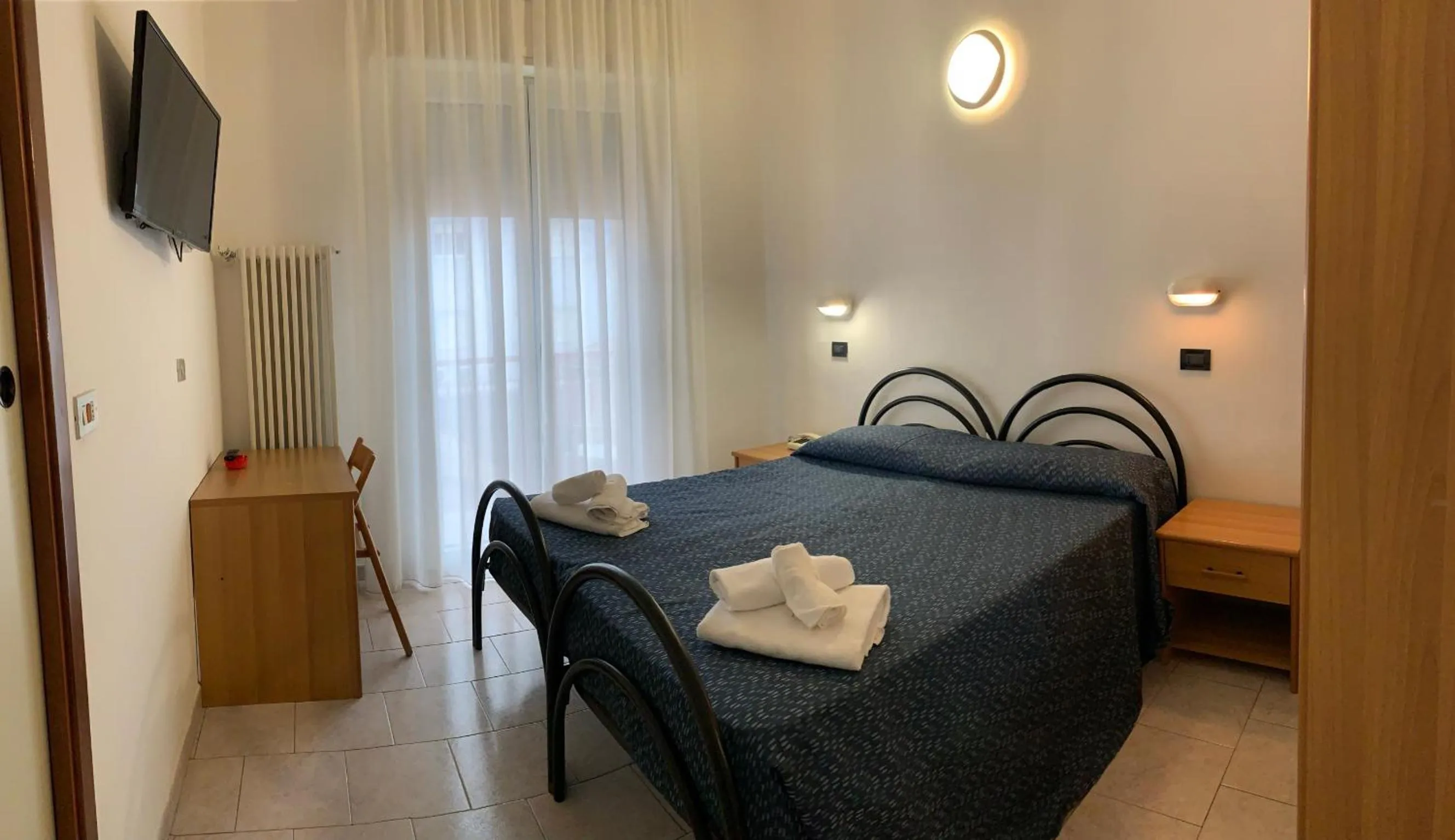 Bed in Hotel Marylise