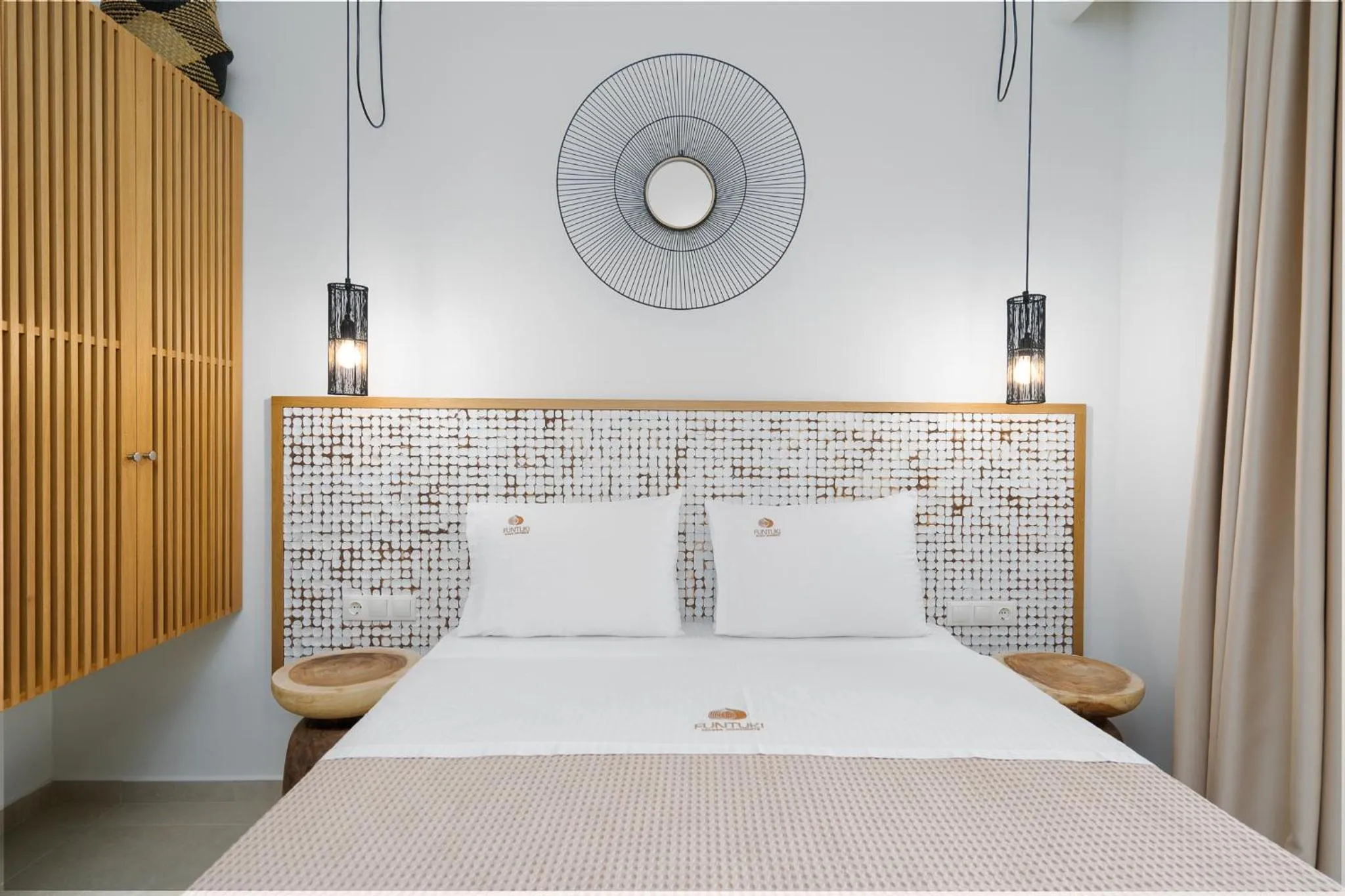 Bed in Funtuki Seaside Apartments