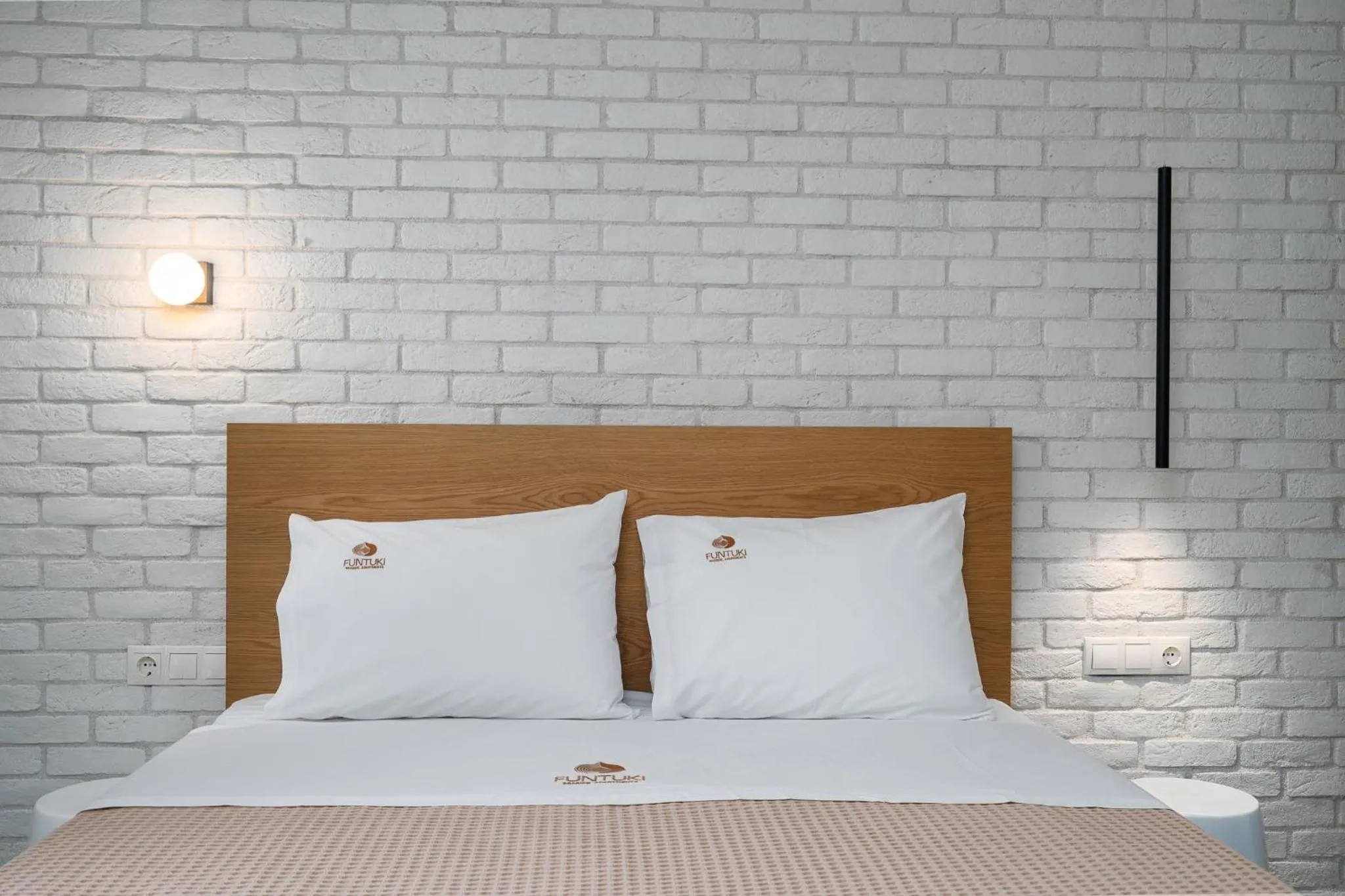 Bed in Funtuki Seaside Apartments