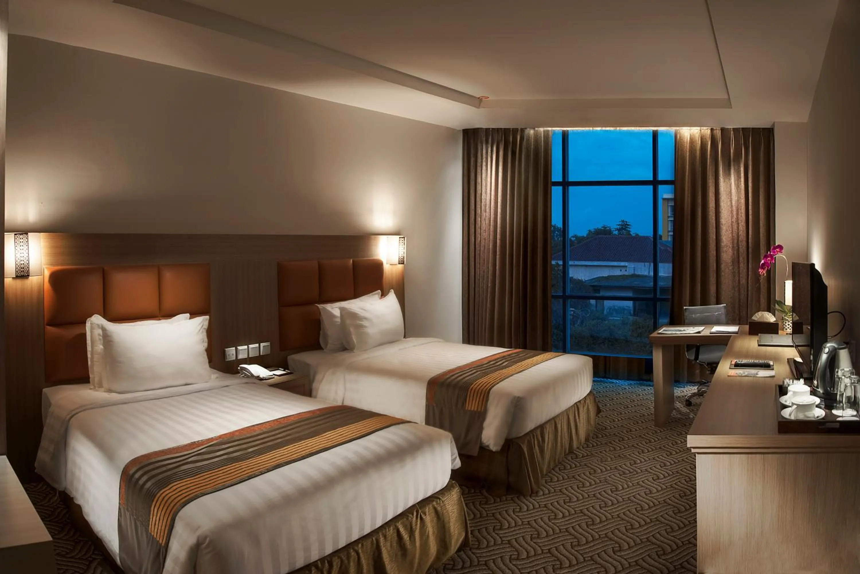 Bed in Cavinton Hotel Malioboro Yogyakarta