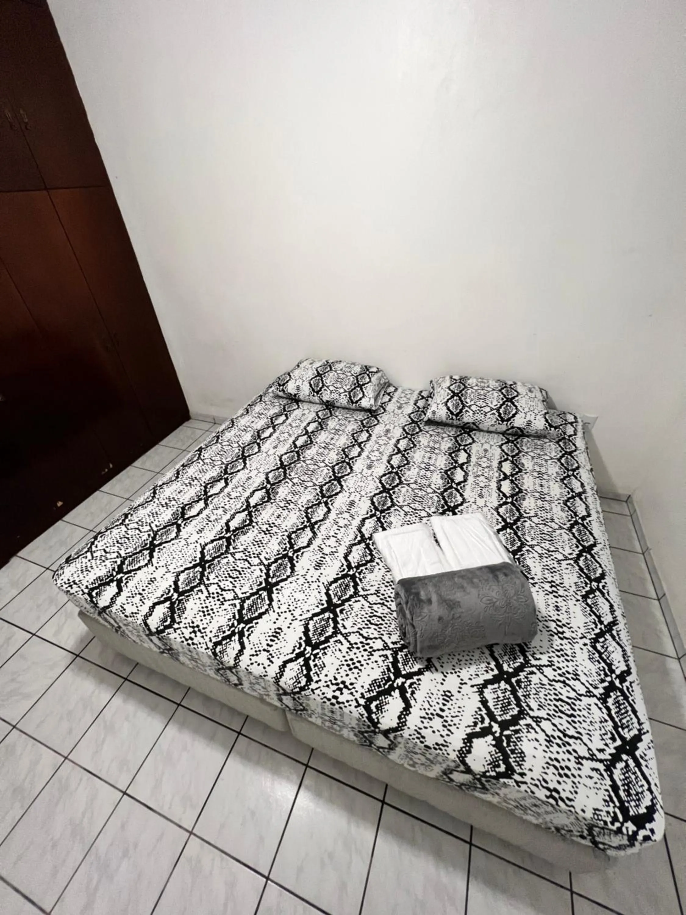 Bed in Pousada Central Jaraguá
