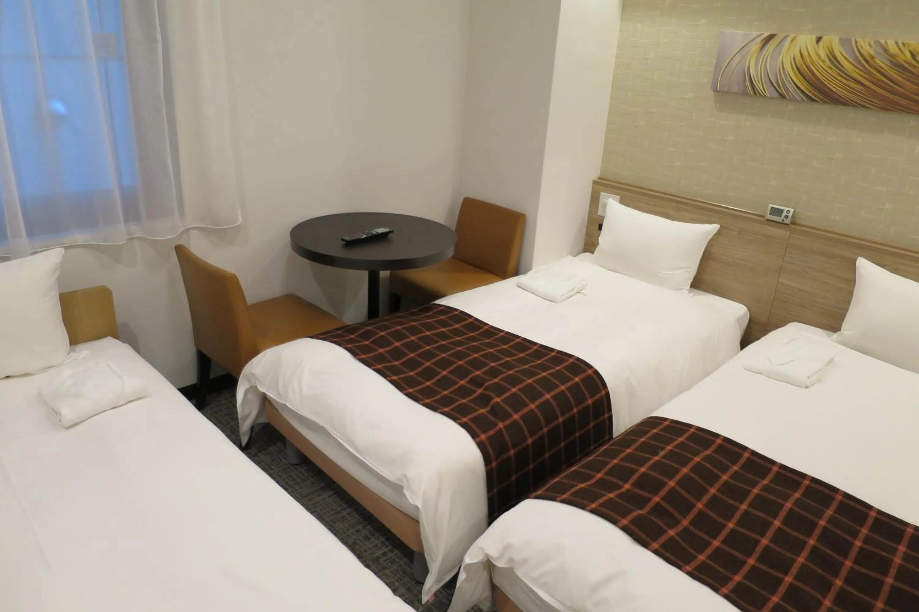 Photo of the whole room in Nest Hotel Osaka Shinsaibashi