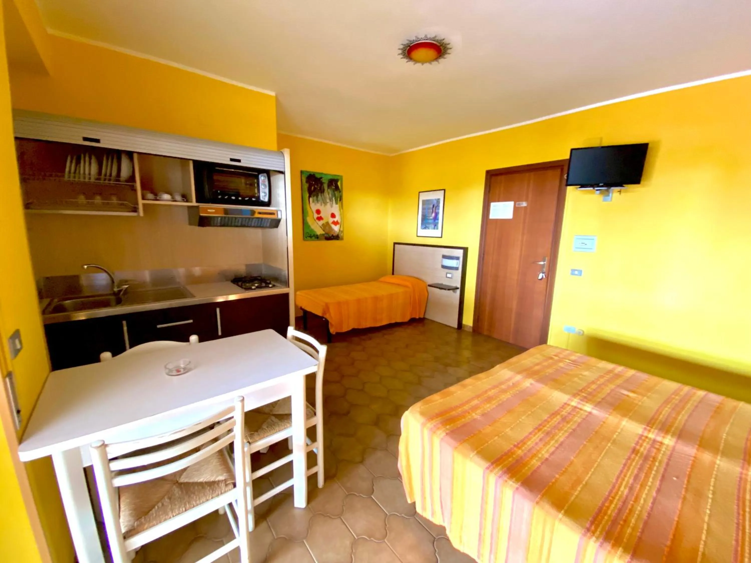 Kitchen or kitchenette, Bed in Residence Hotel Felix