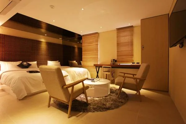 Bed in Jeju Cullinan Hotel