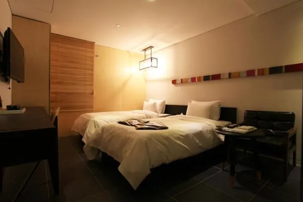 Bed in Jeju Cullinan Hotel