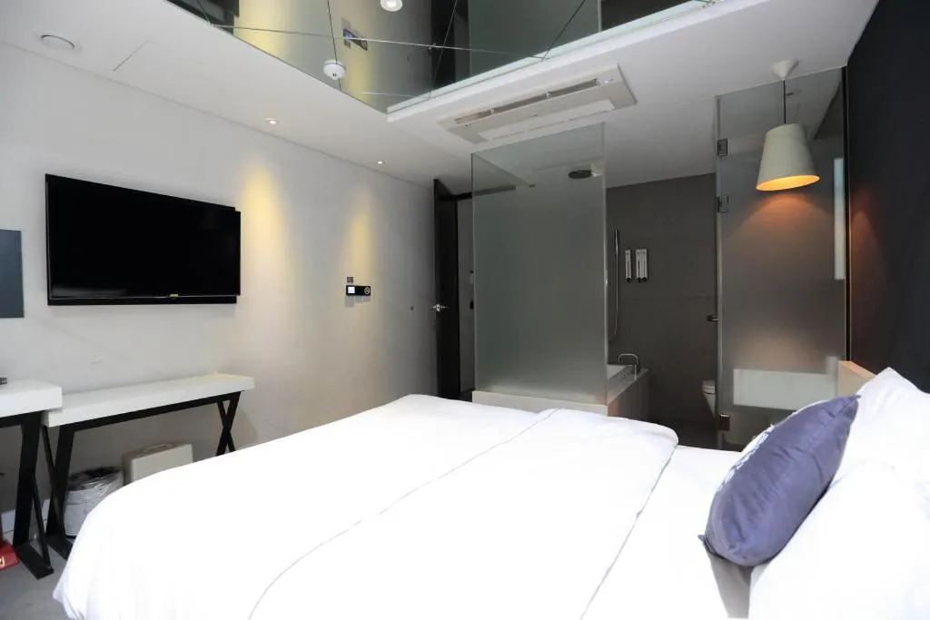 Bed in Jeju Cullinan Hotel