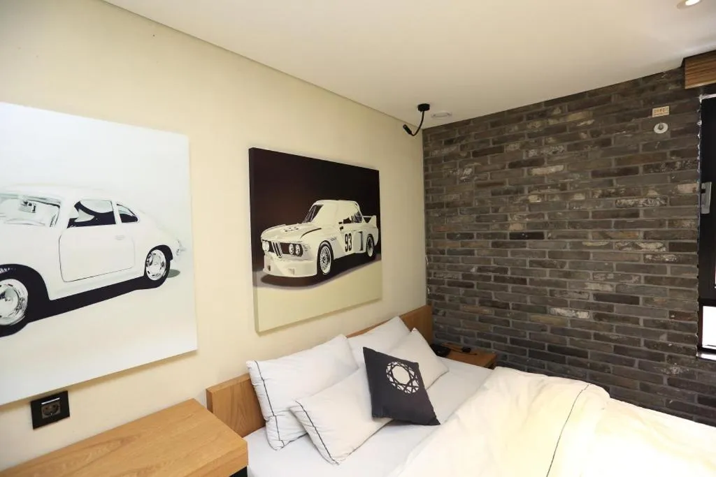 Bed in Jeju Cullinan Hotel